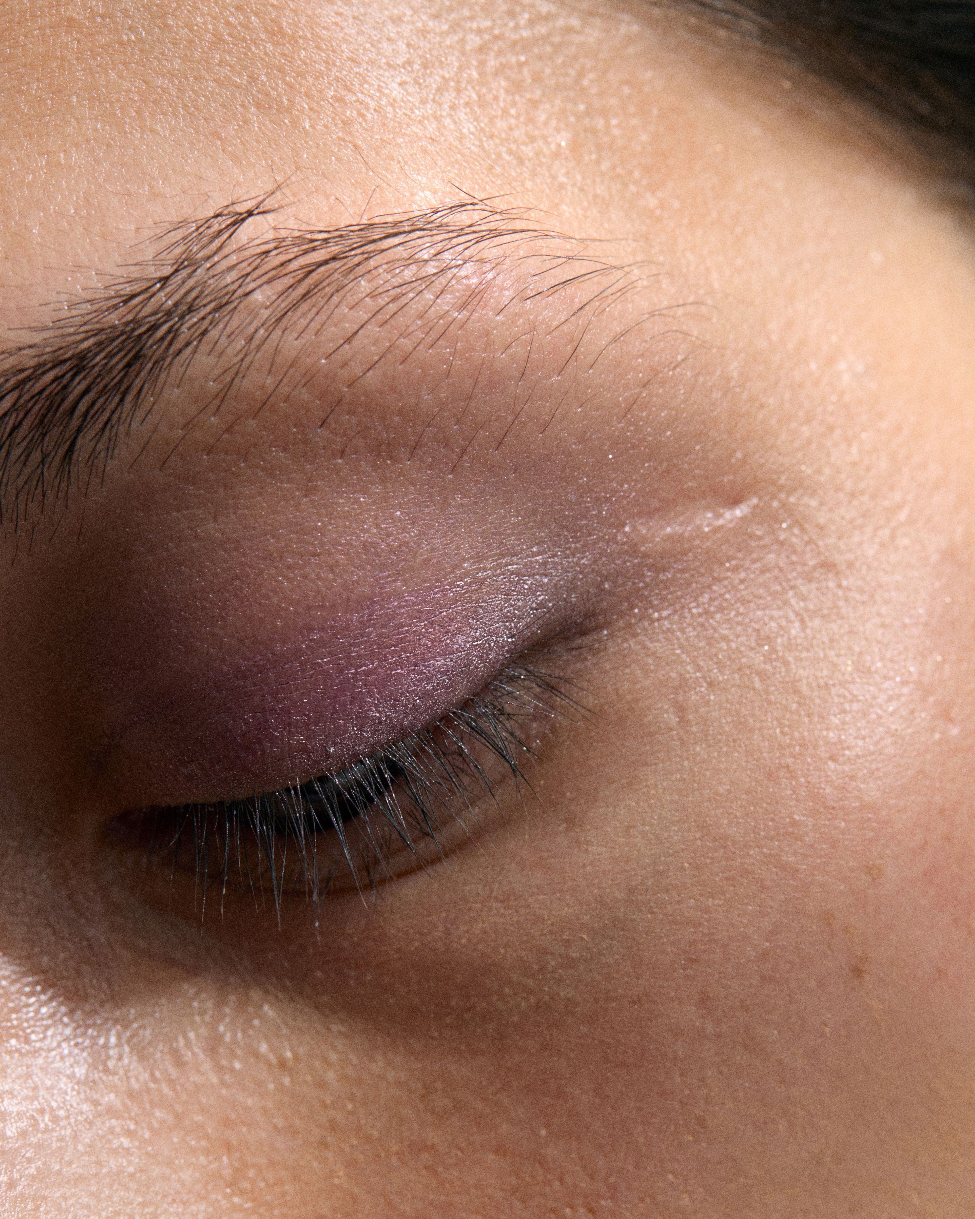 Close up of mans eye with Eye Pen Purple Haze applied