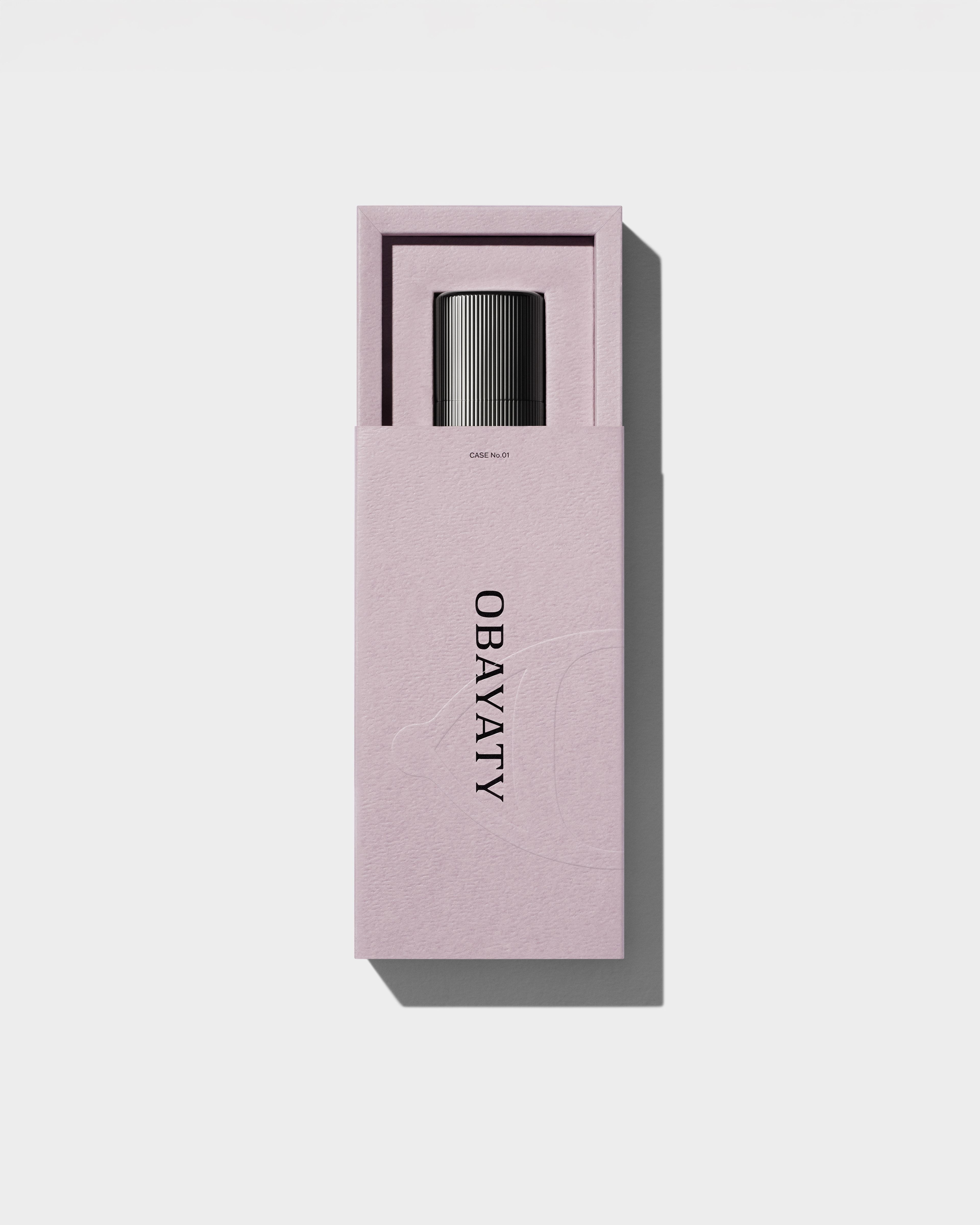 Purple Face Booster packaging laying on a grey surface