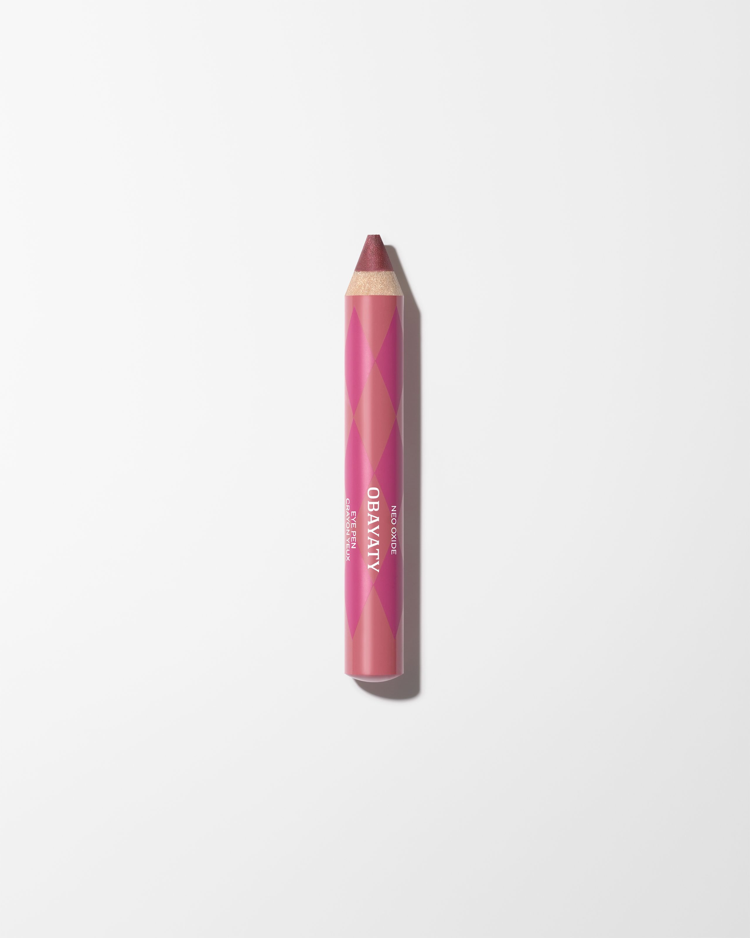 Eye Pen for men laying on a grey background