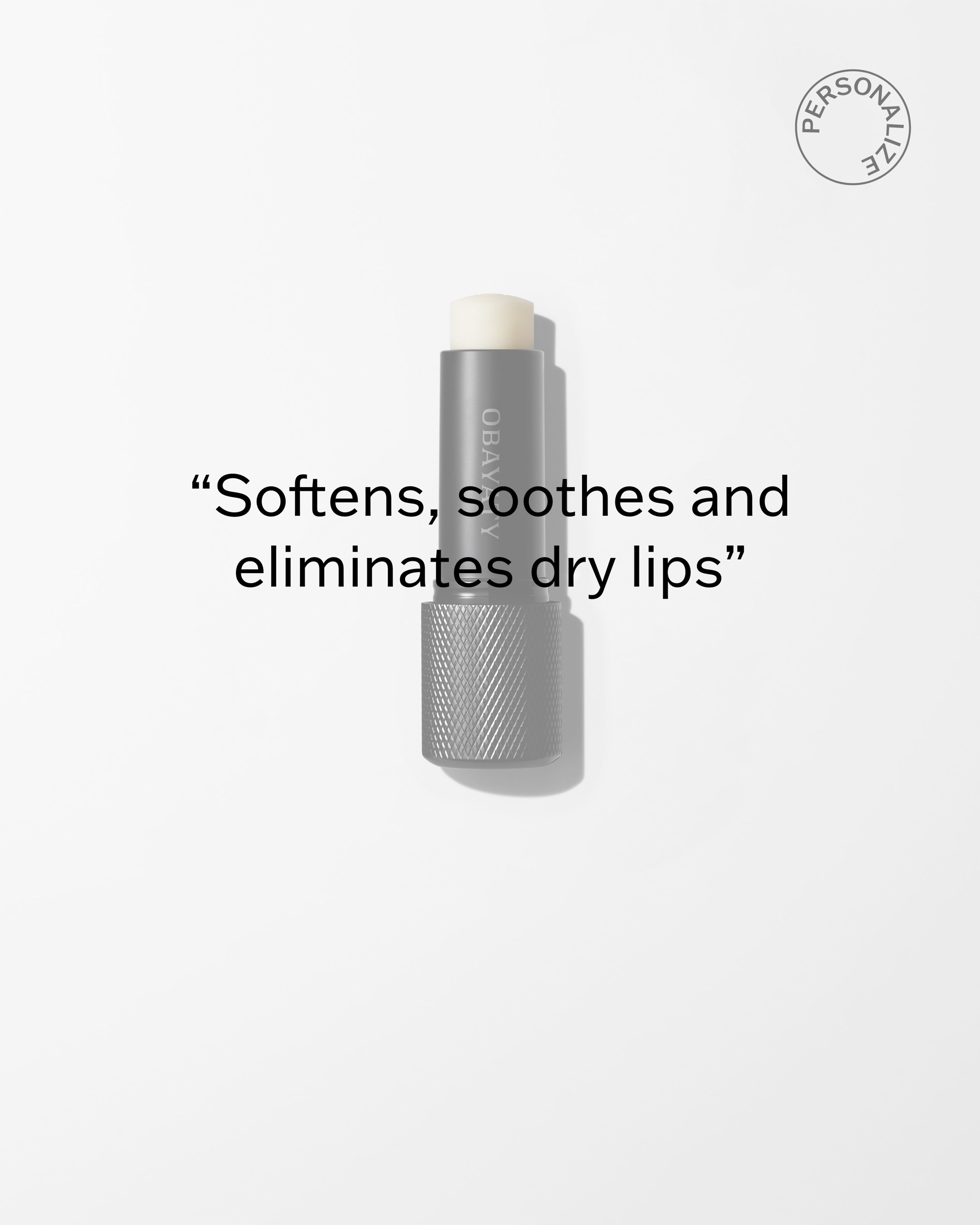 Soothing Lip Balm laying on a grey surface