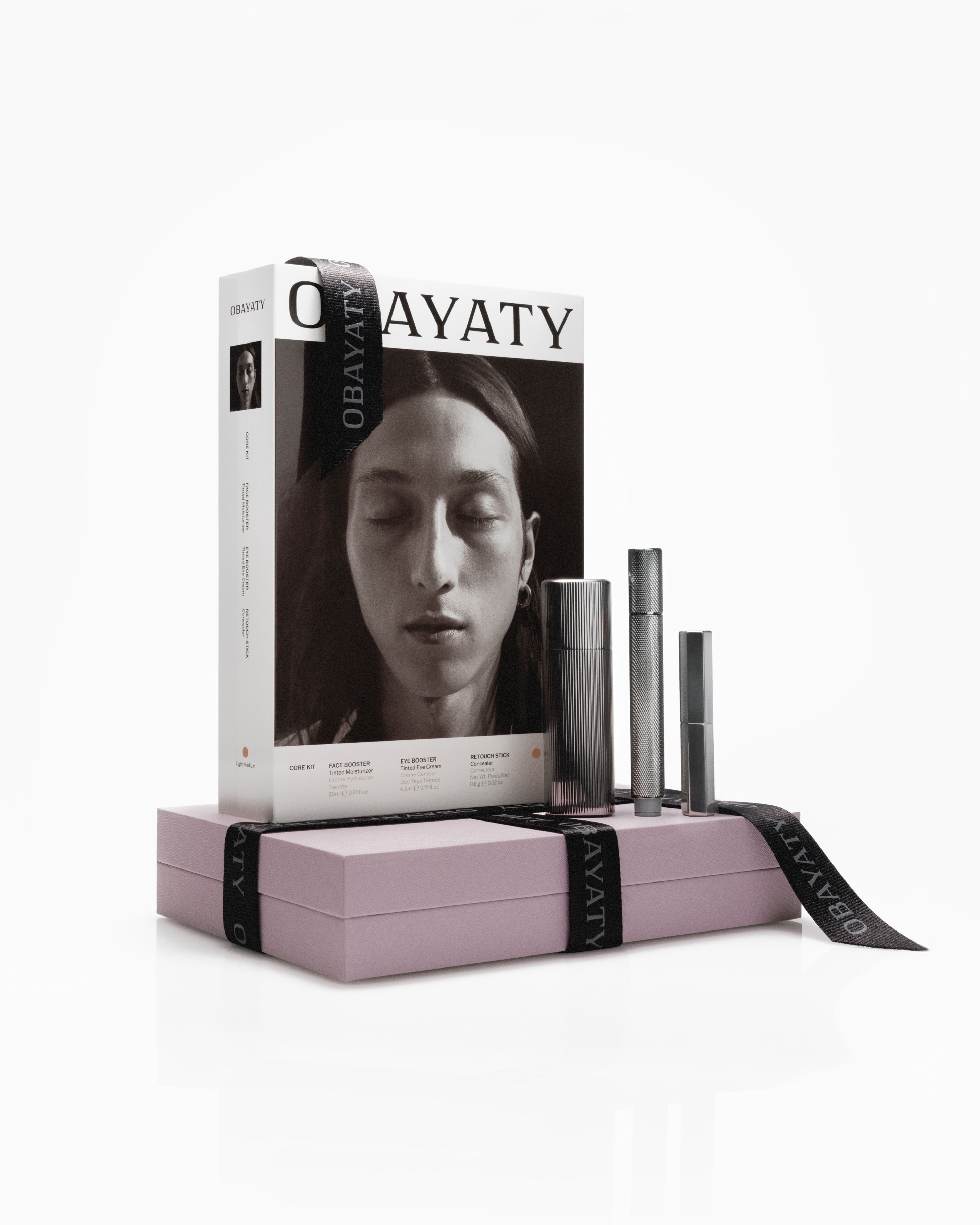 Make up kit for men in front of a grey background