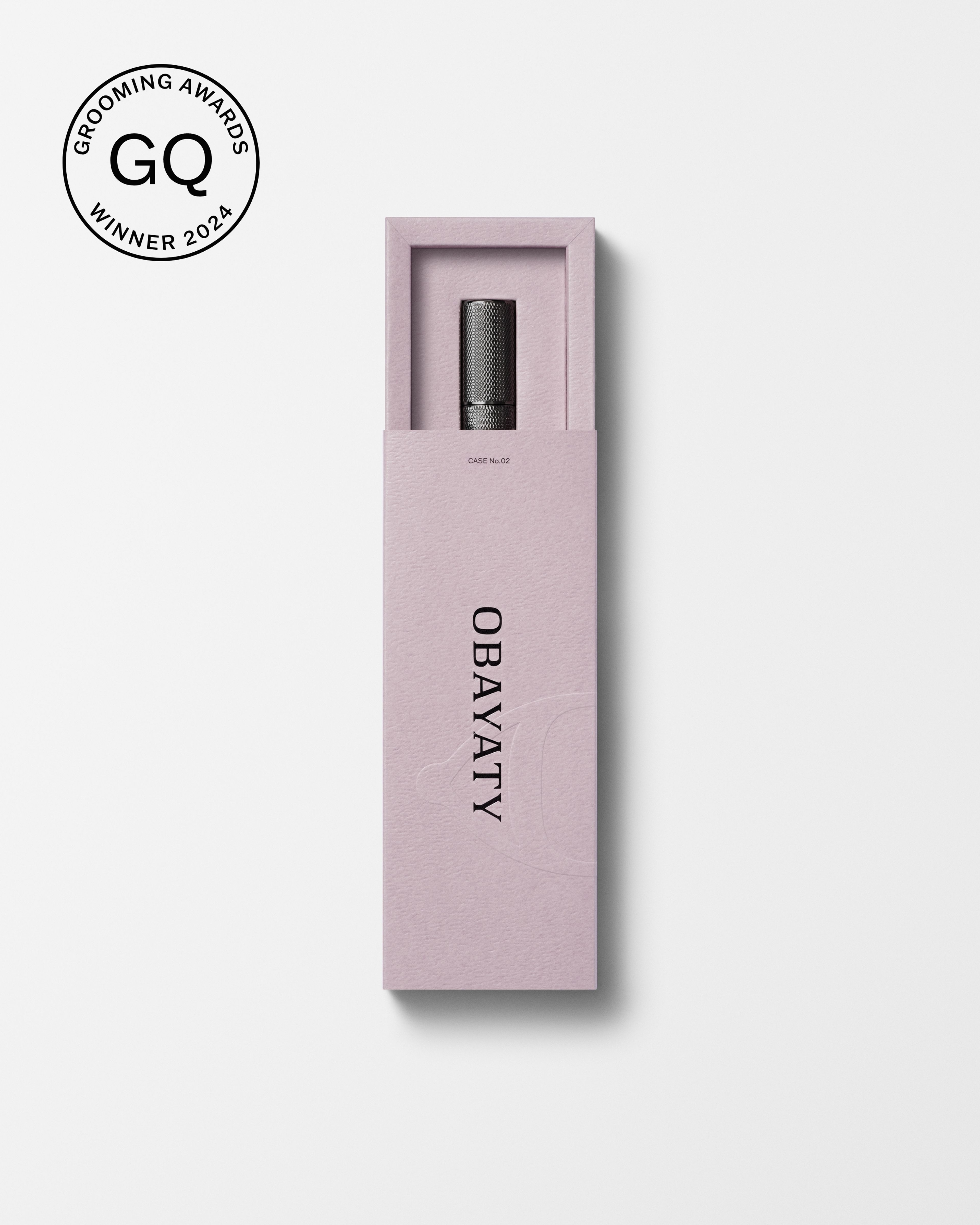 Men's tinted eye cream laying on a grey surface