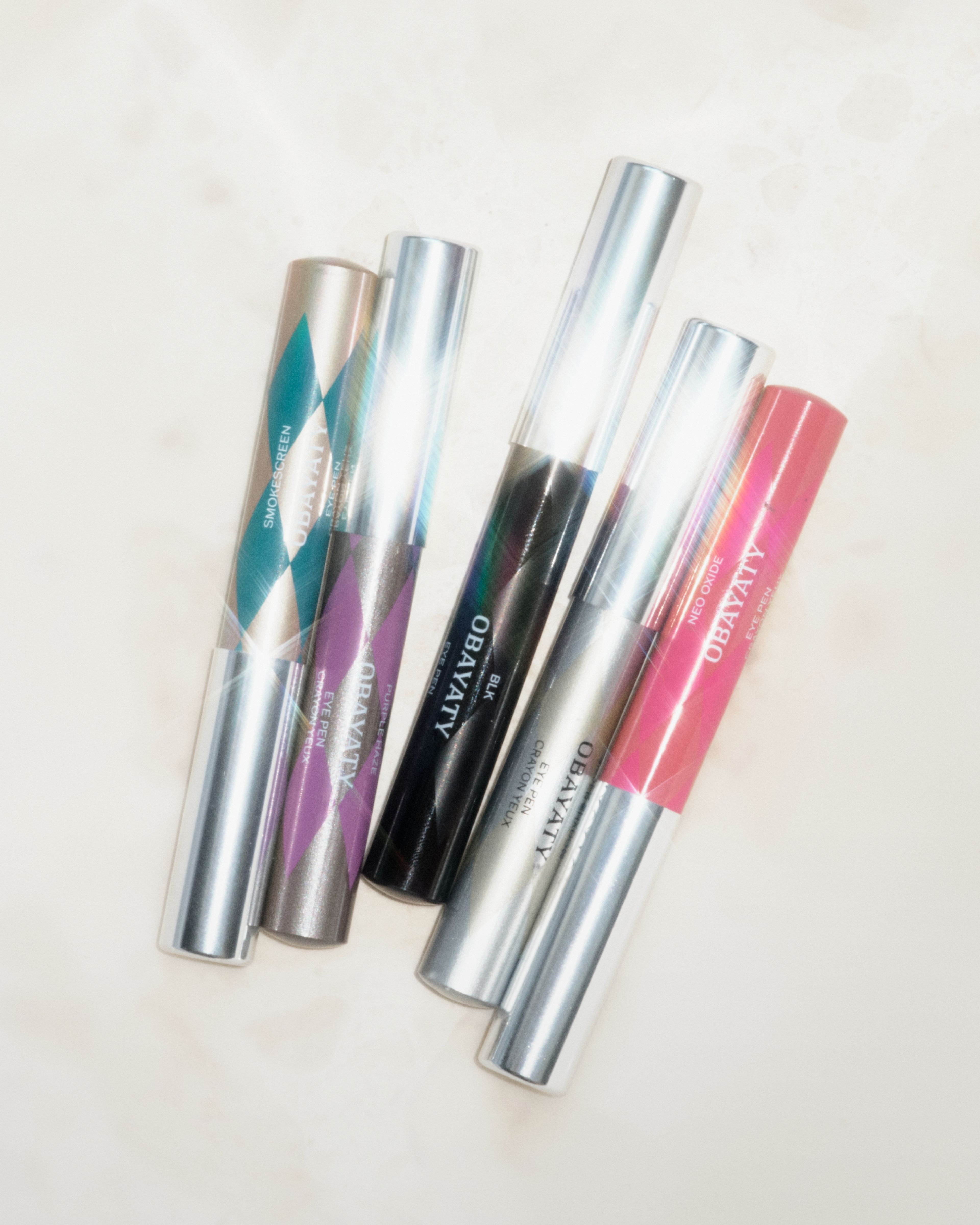 Eye Pens laying on marble