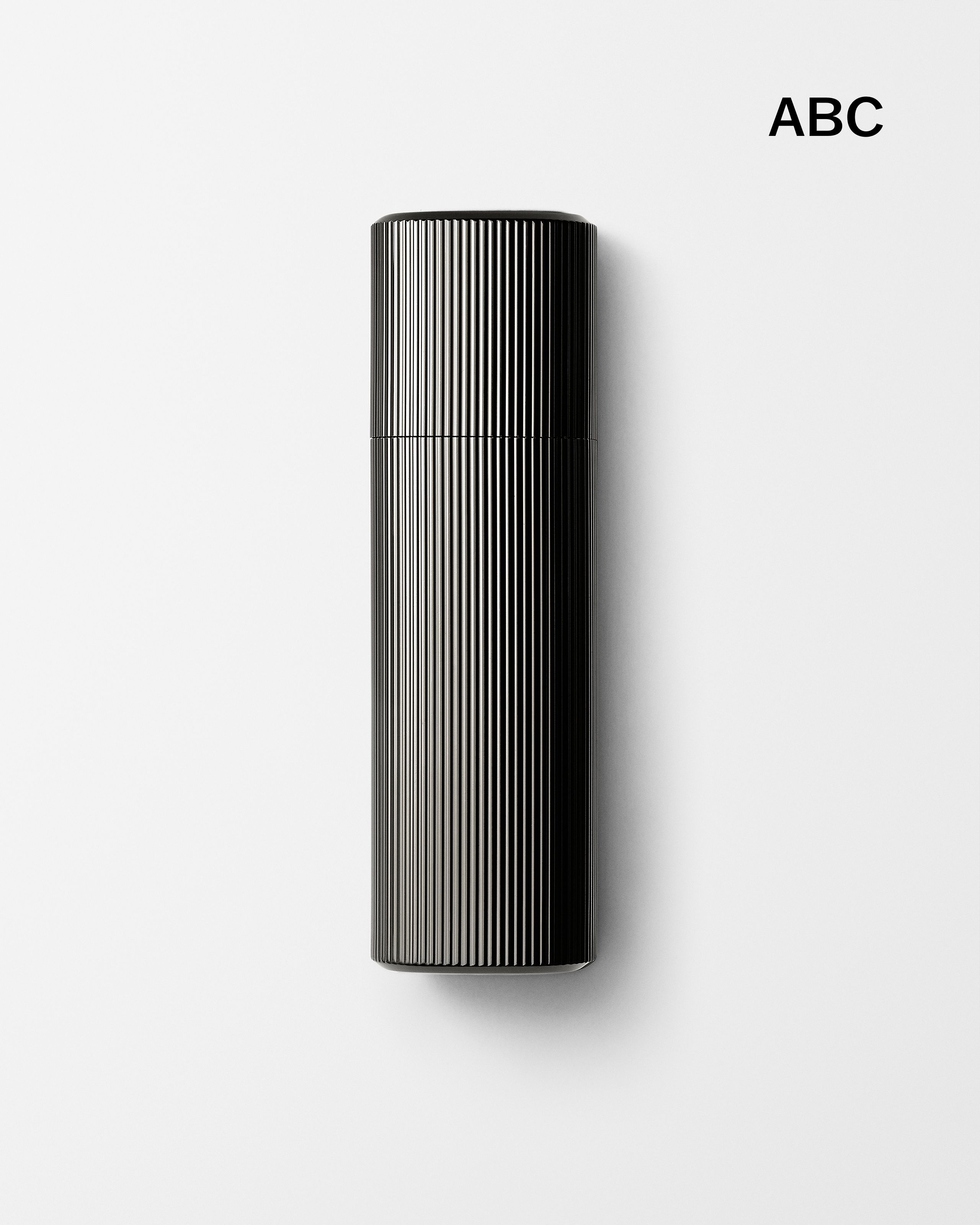 Men's moisturizer laying on a grey background