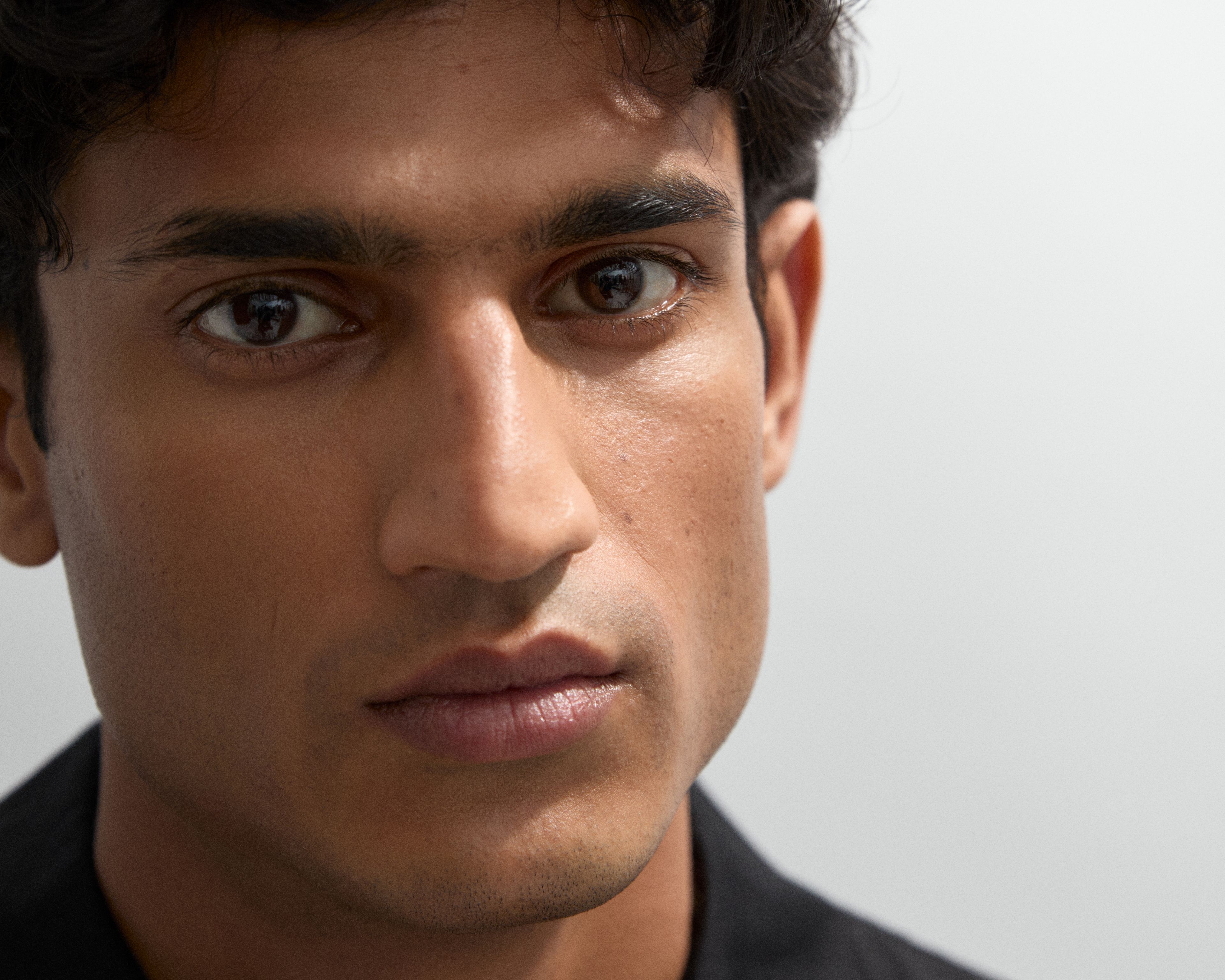 Man in front of camera