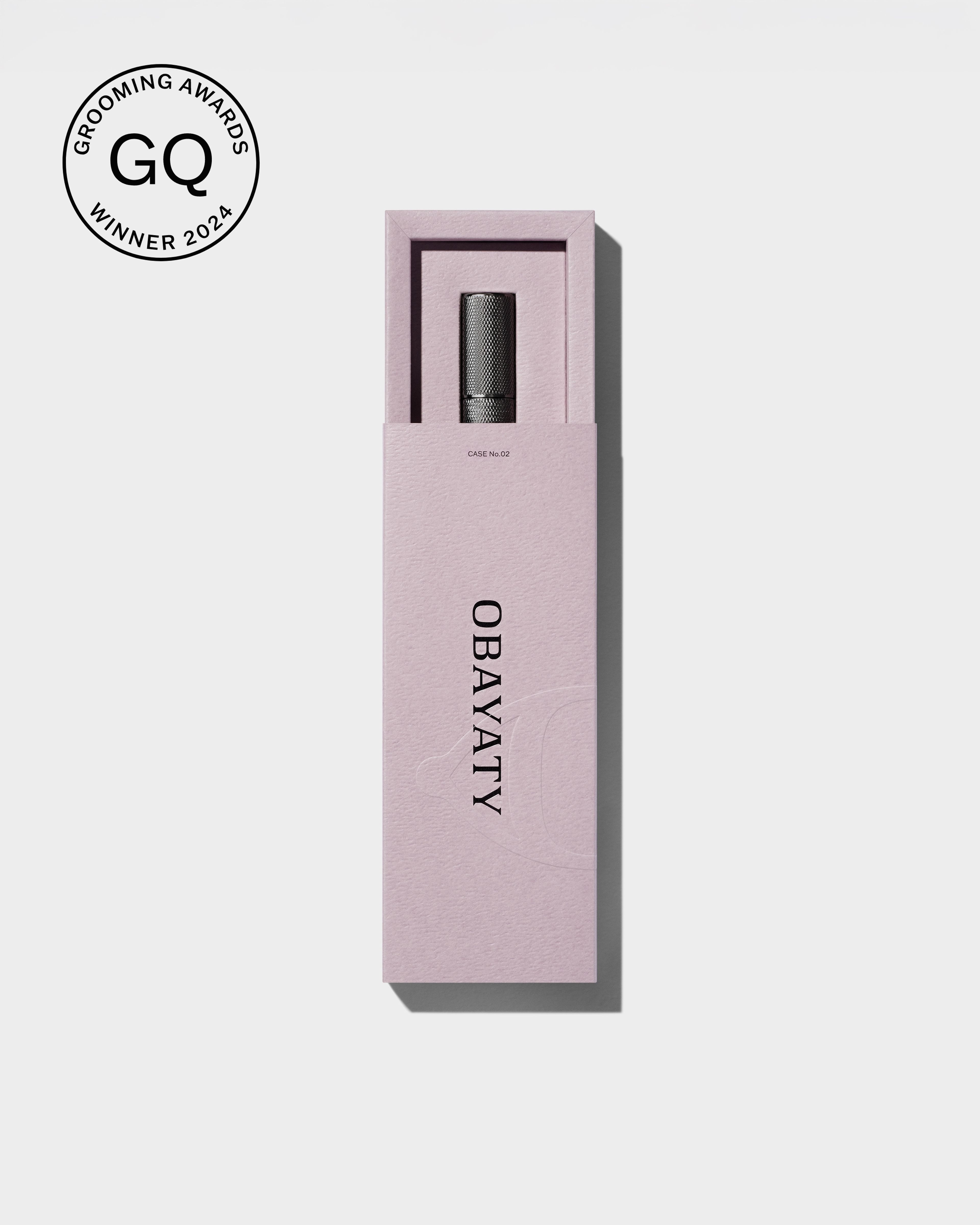 Men's tinted eye cream laying on a grey surface