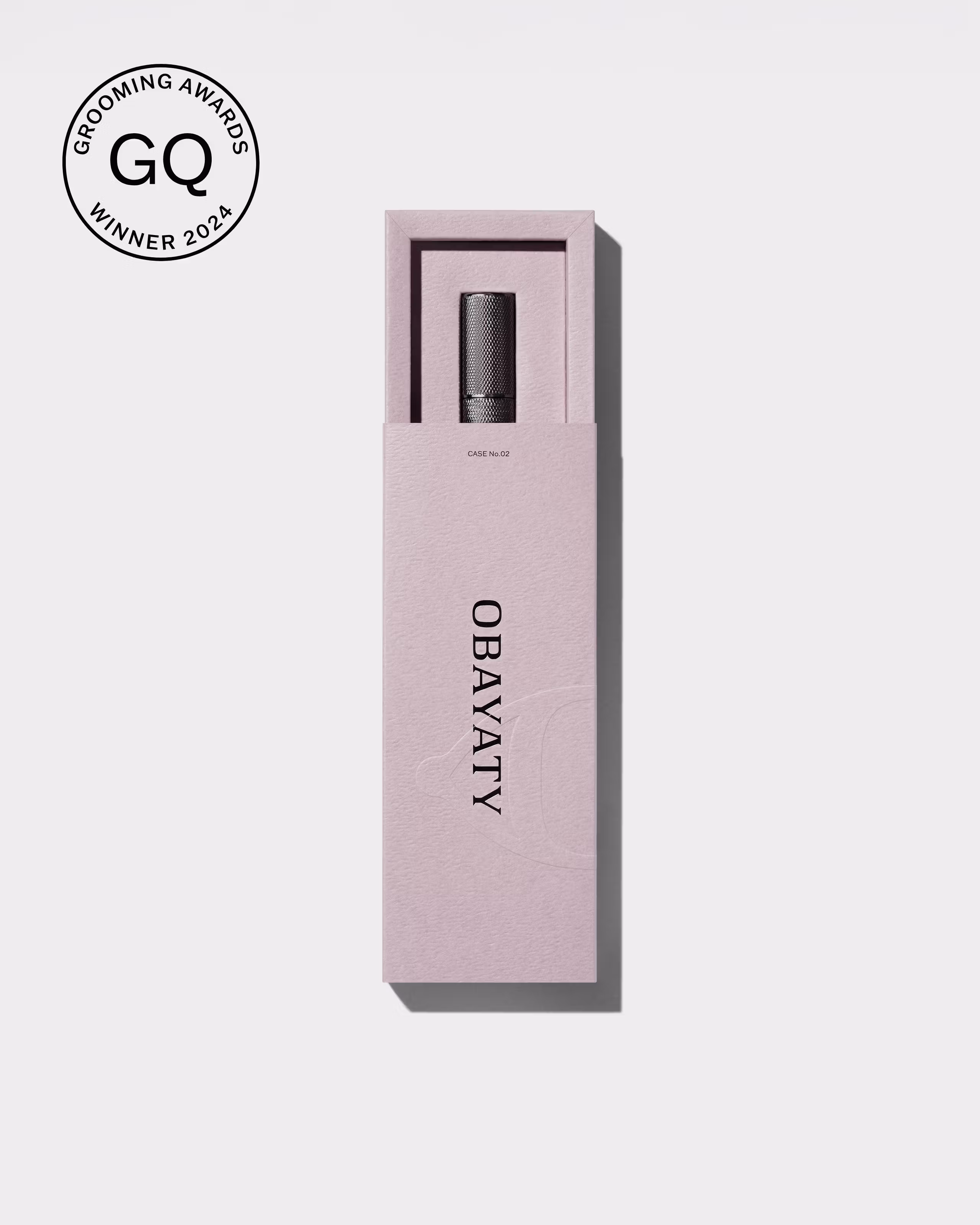 Men's tinted eye cream laying on a grey surface