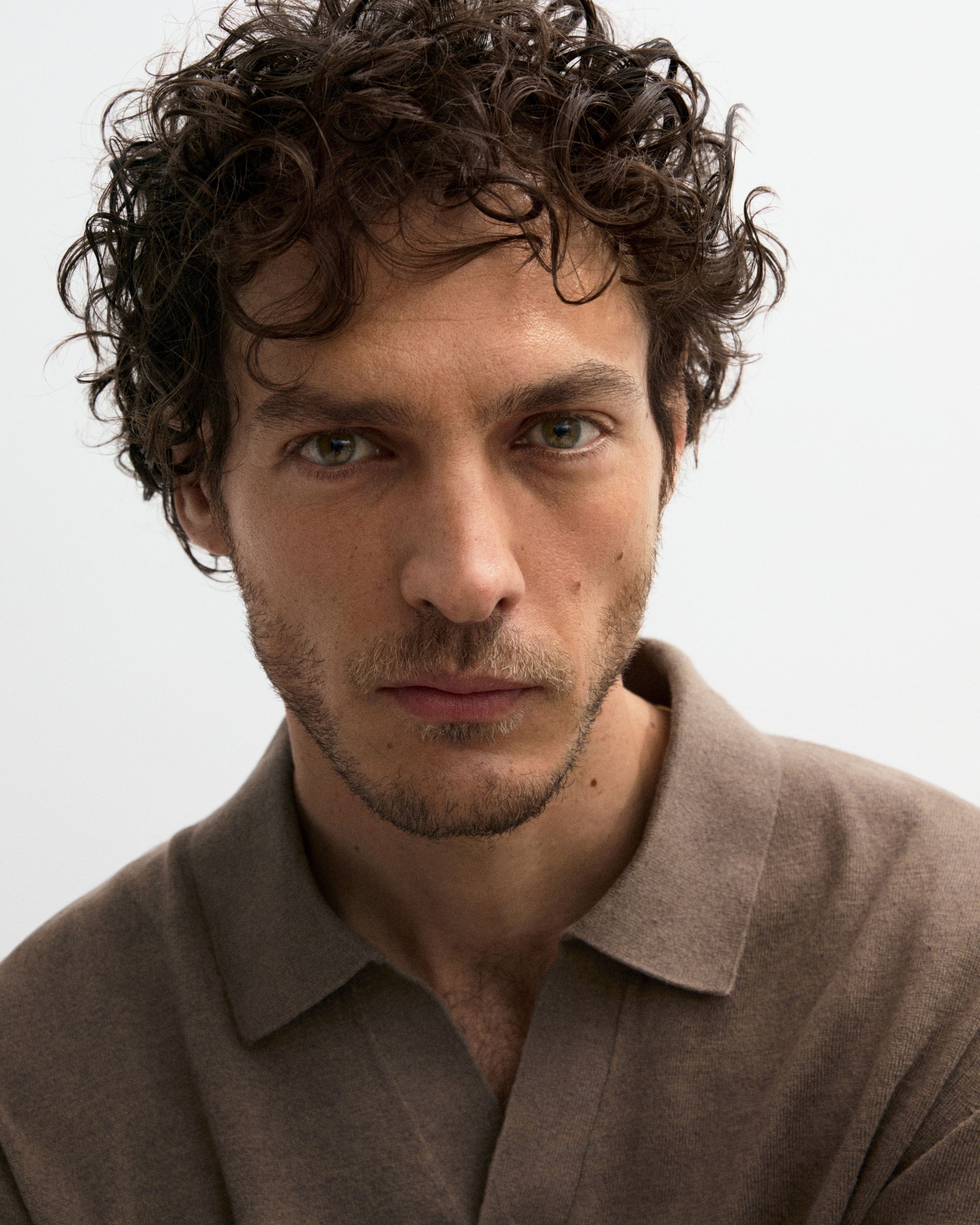Man looking into the camera with the tinted moisturizer applied