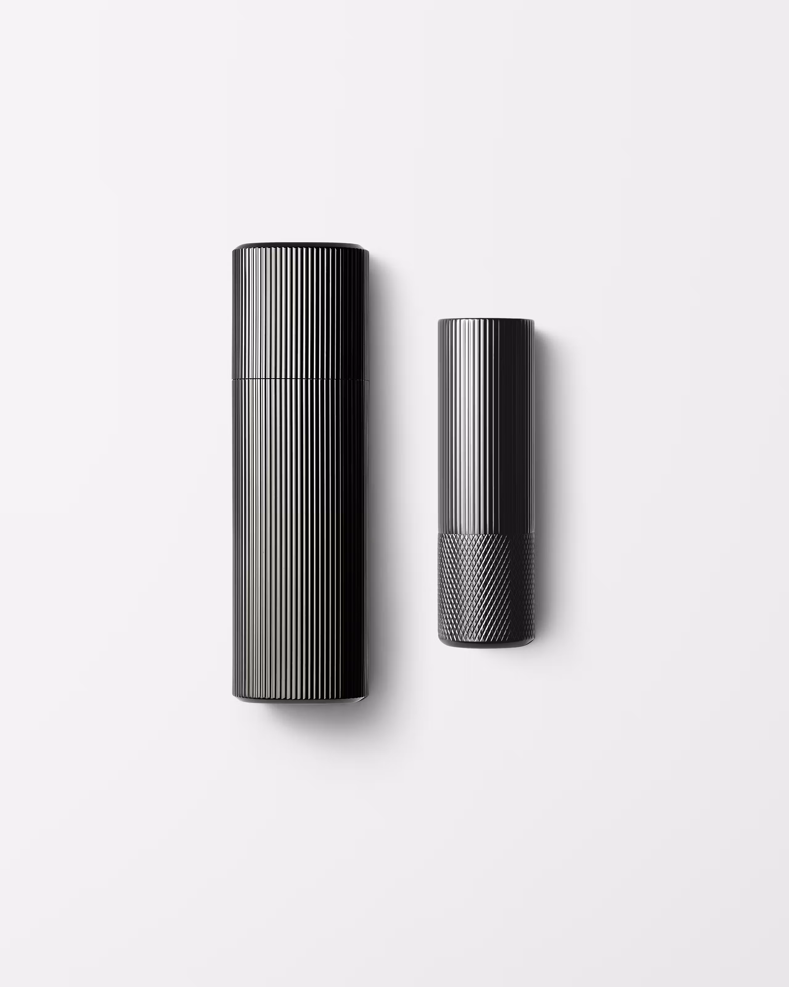 Men's moisturizer and lip balm laying on a grey background