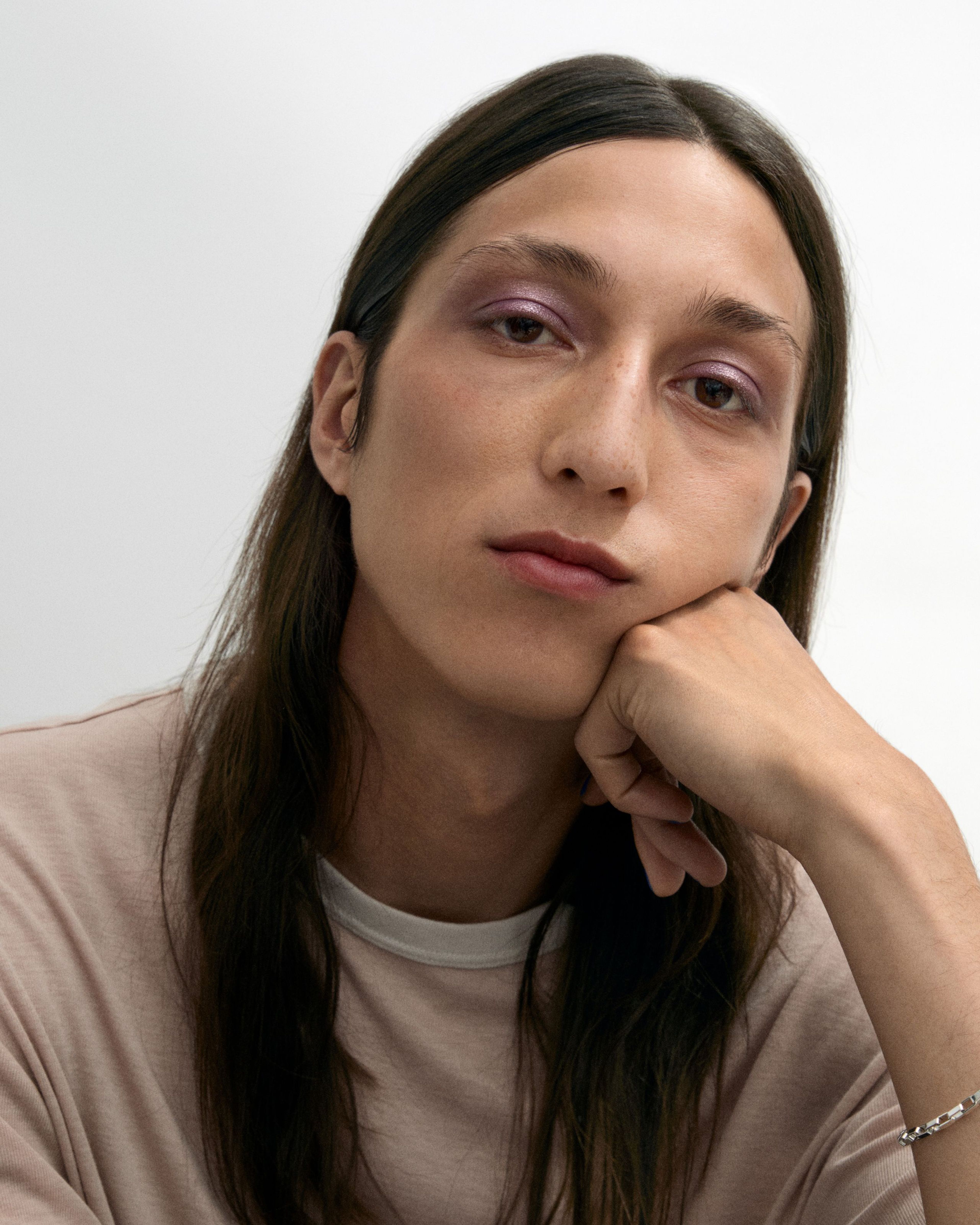 Man with closed eyes with Eye Pen Purple Haze applied