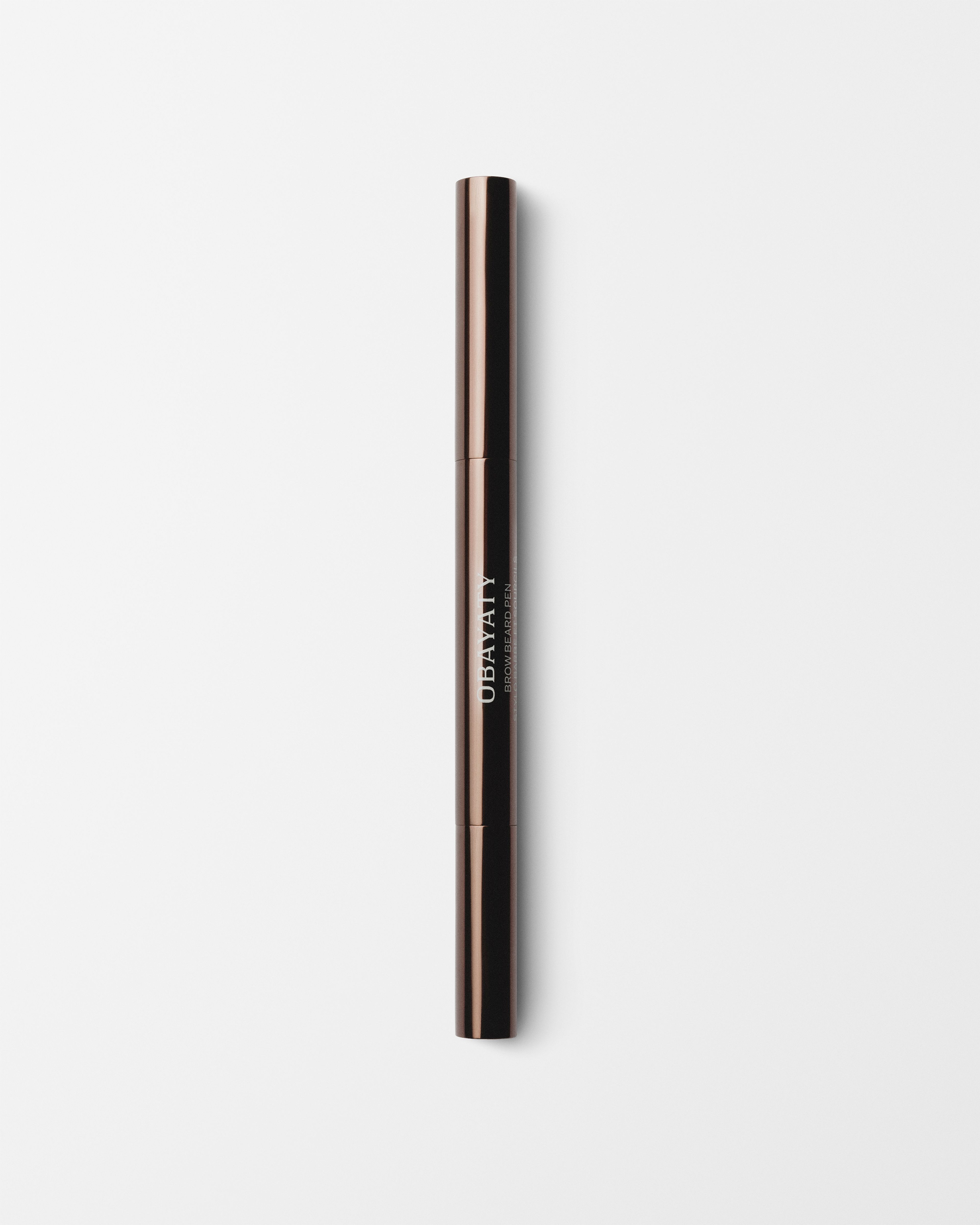 Brow Beard Pen for men laying on a grey surface