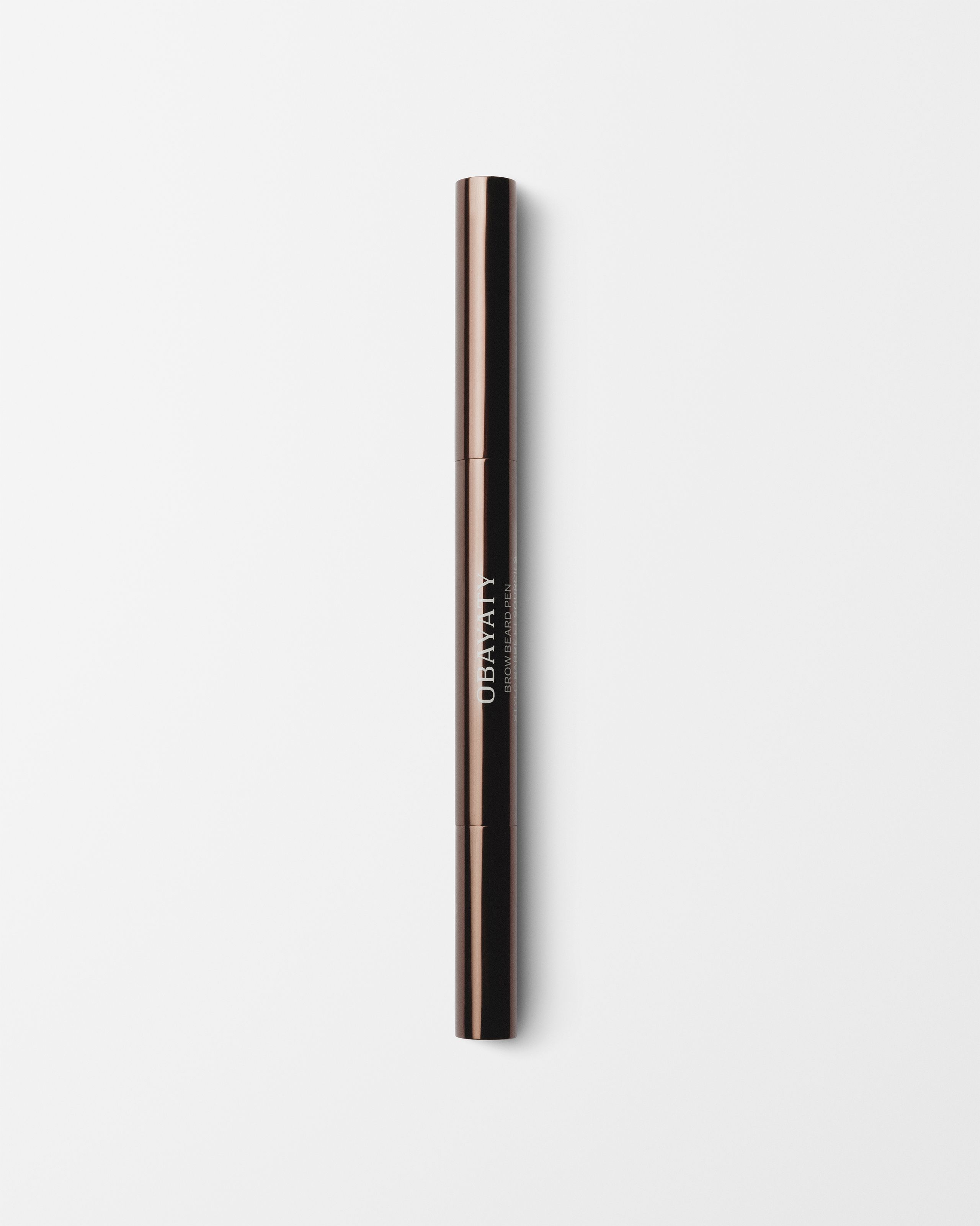 Brow Beard Pen for men laying on a grey surface