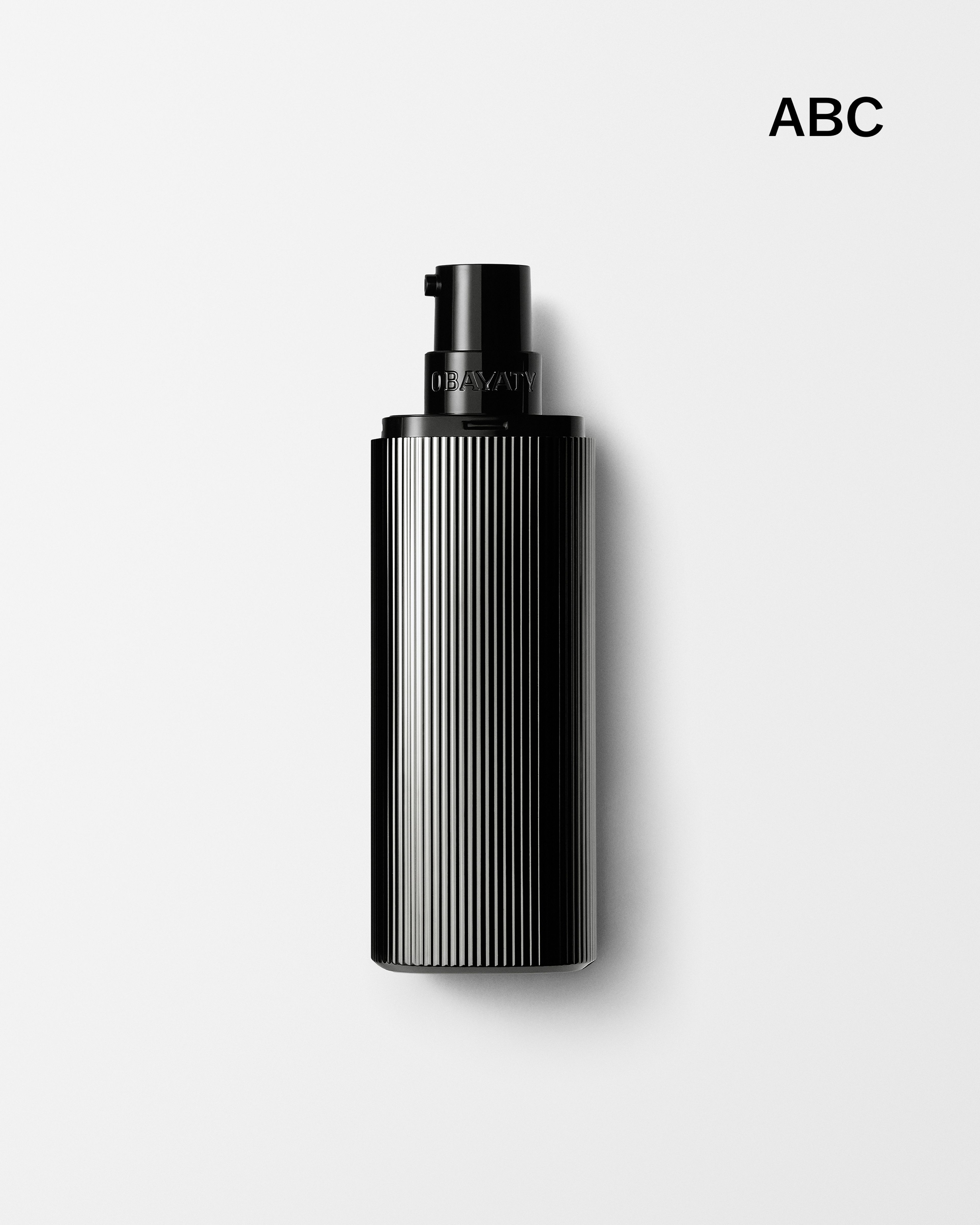 Men's moisturizer laying on a grey background