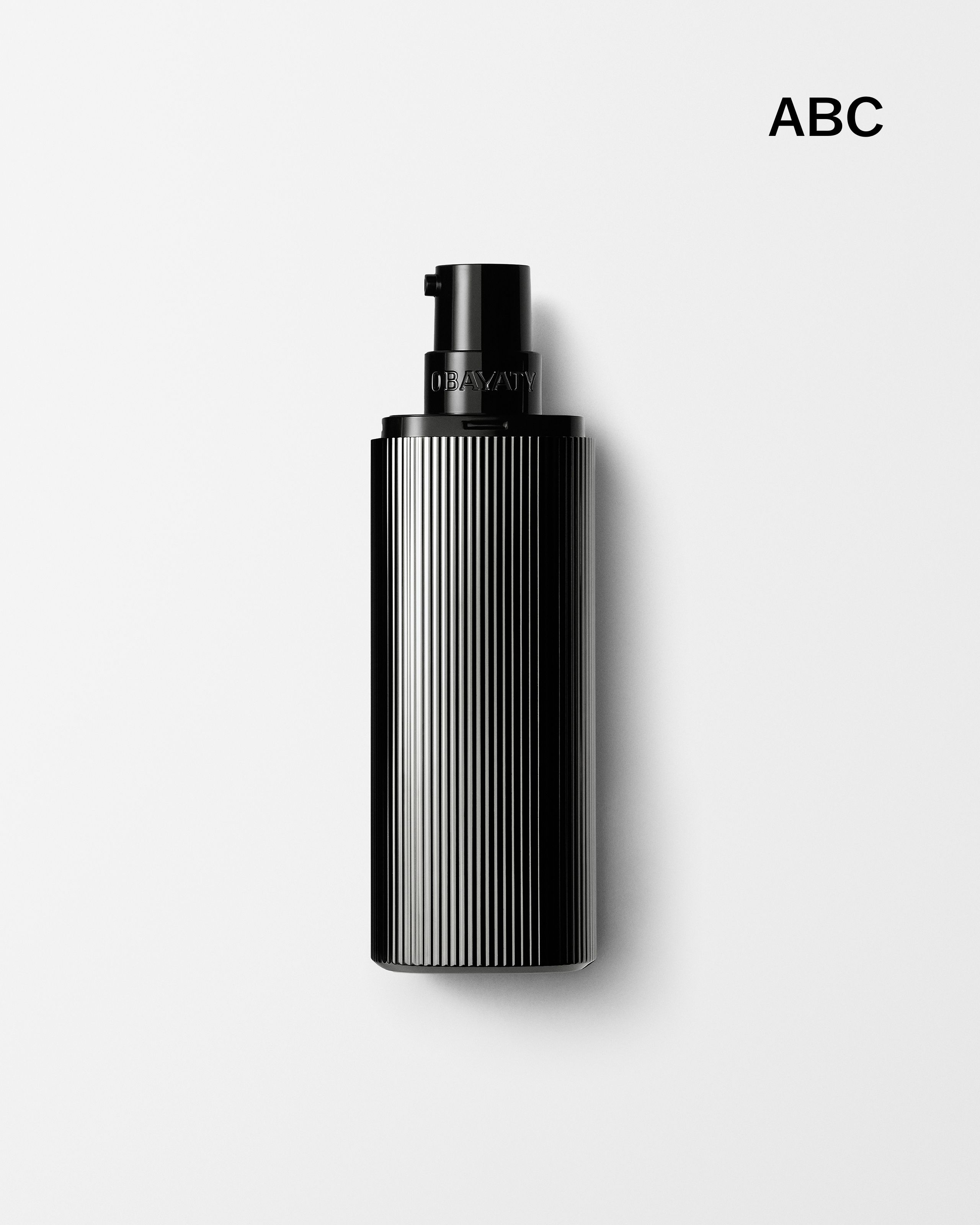 Men's moisturizer laying on a grey background