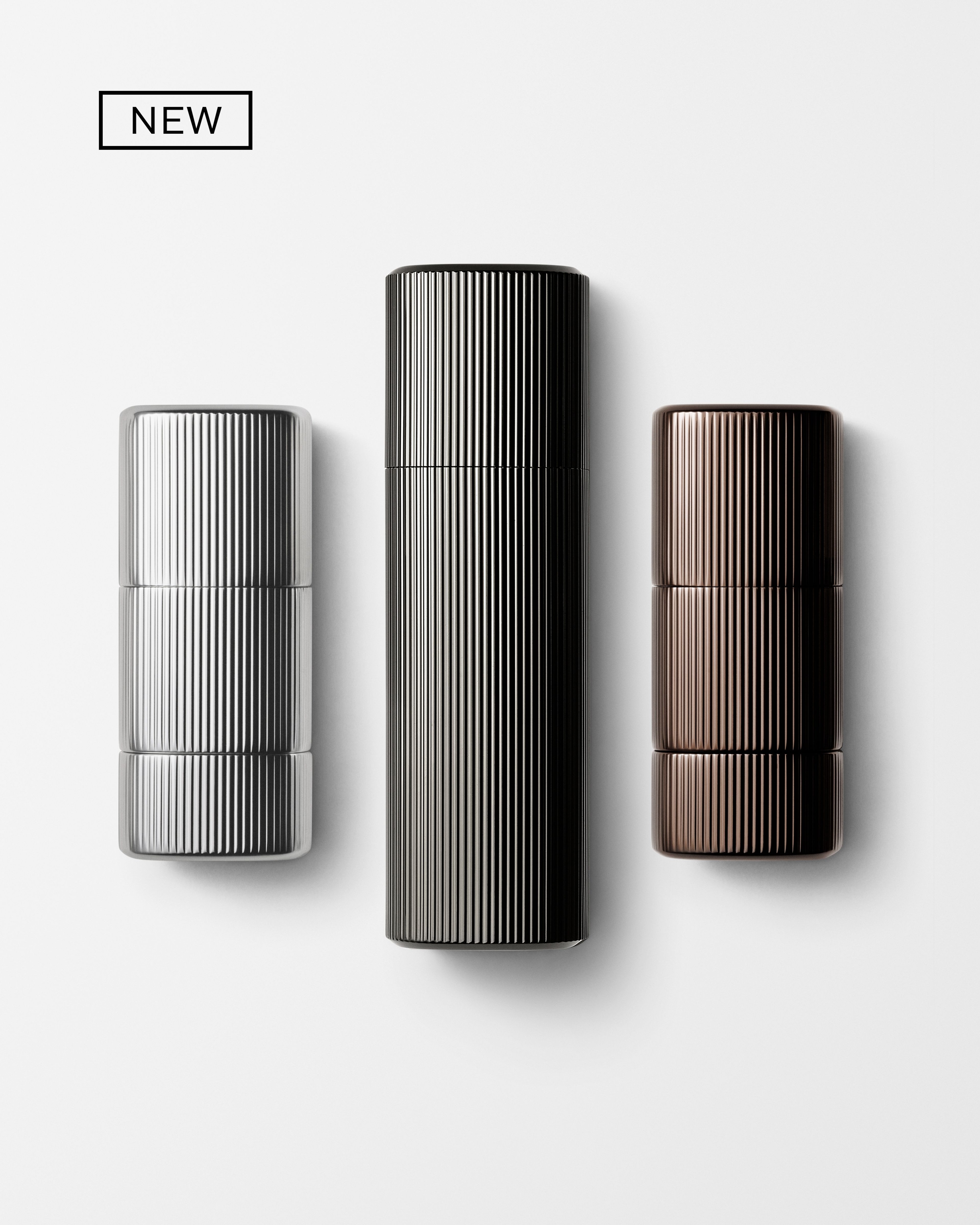 Men's kit of make up products laying on grey background