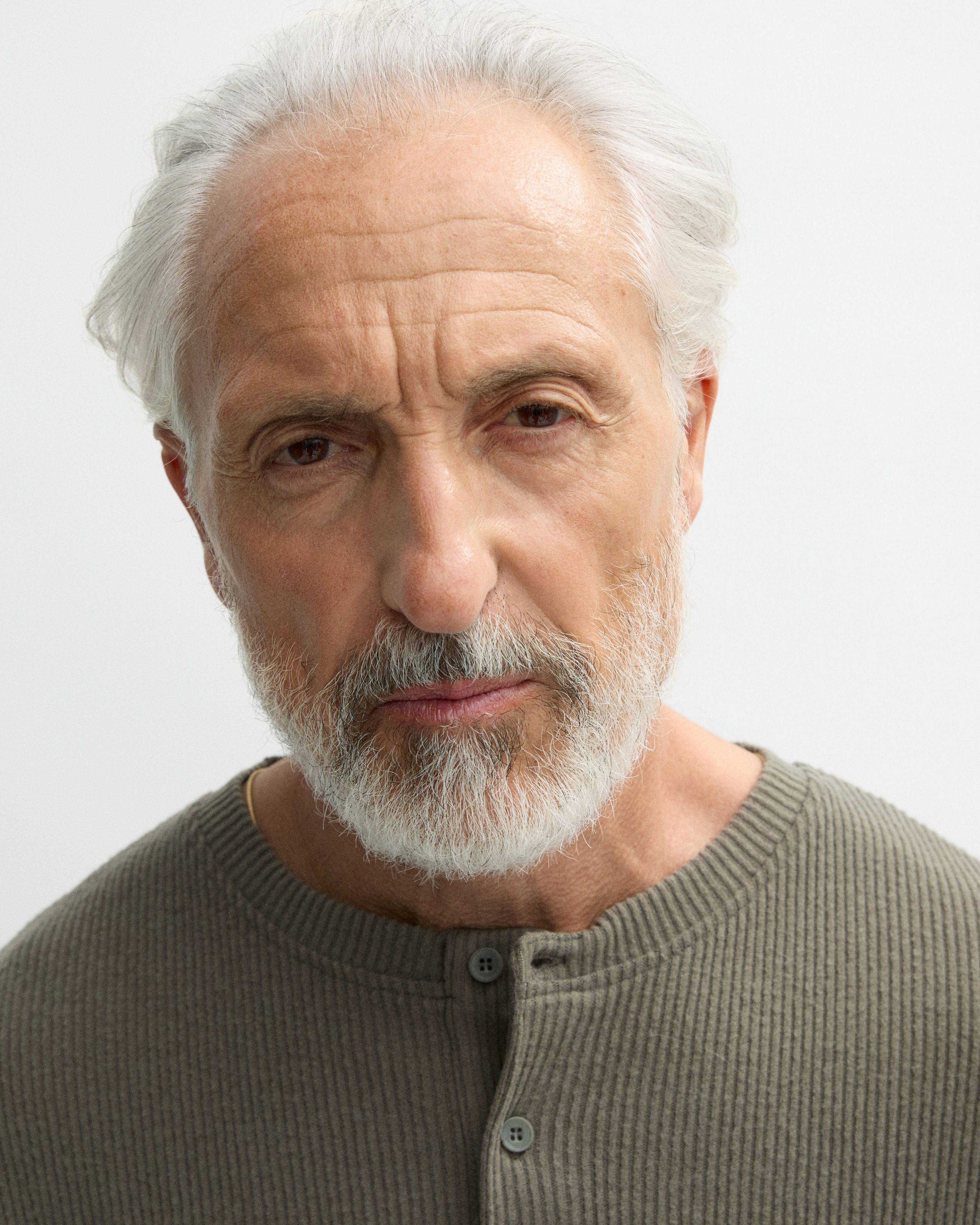 Man looking into the camera with the tinted moisturizer applied
