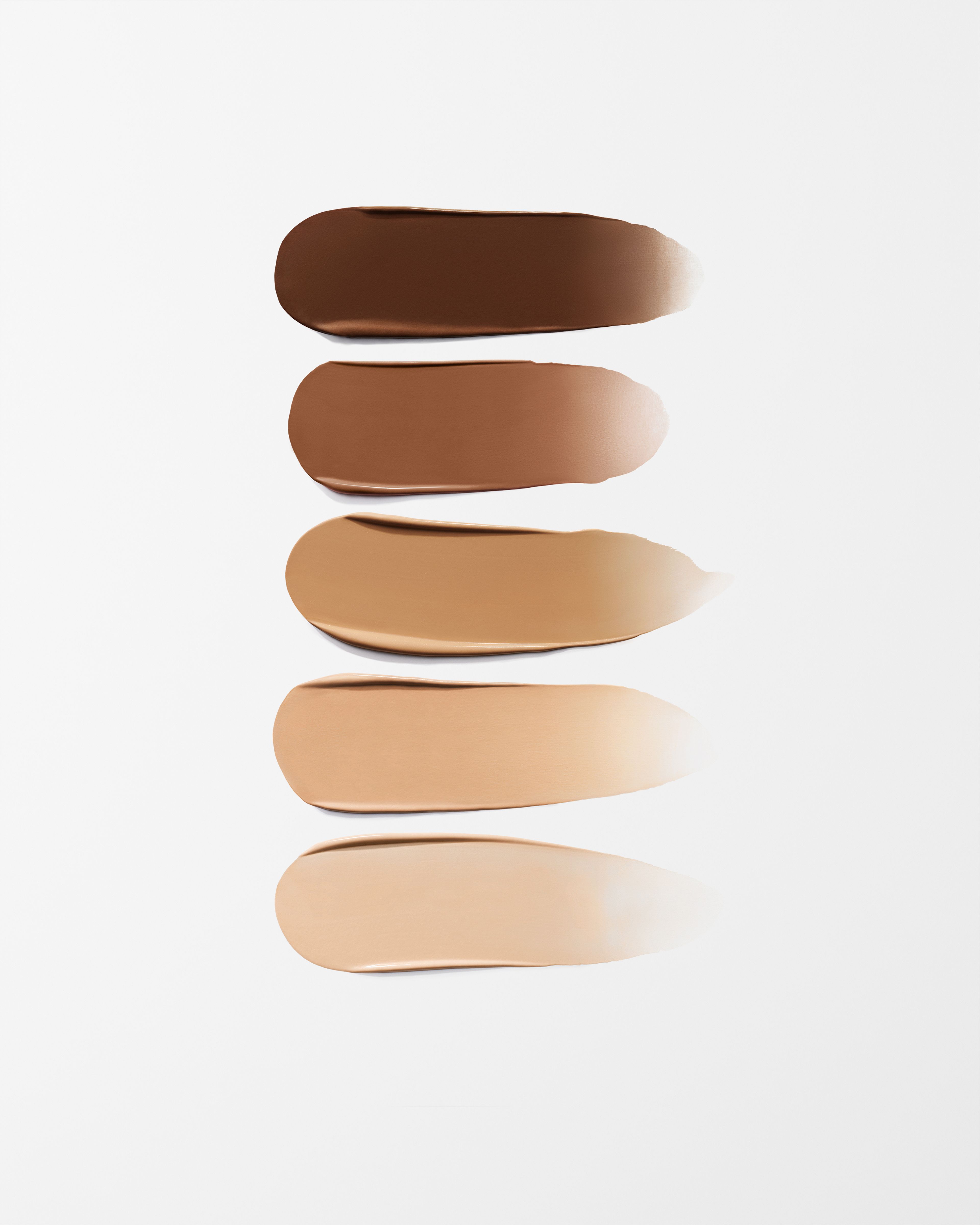 Tinted Moisturizer Swatches on grey background