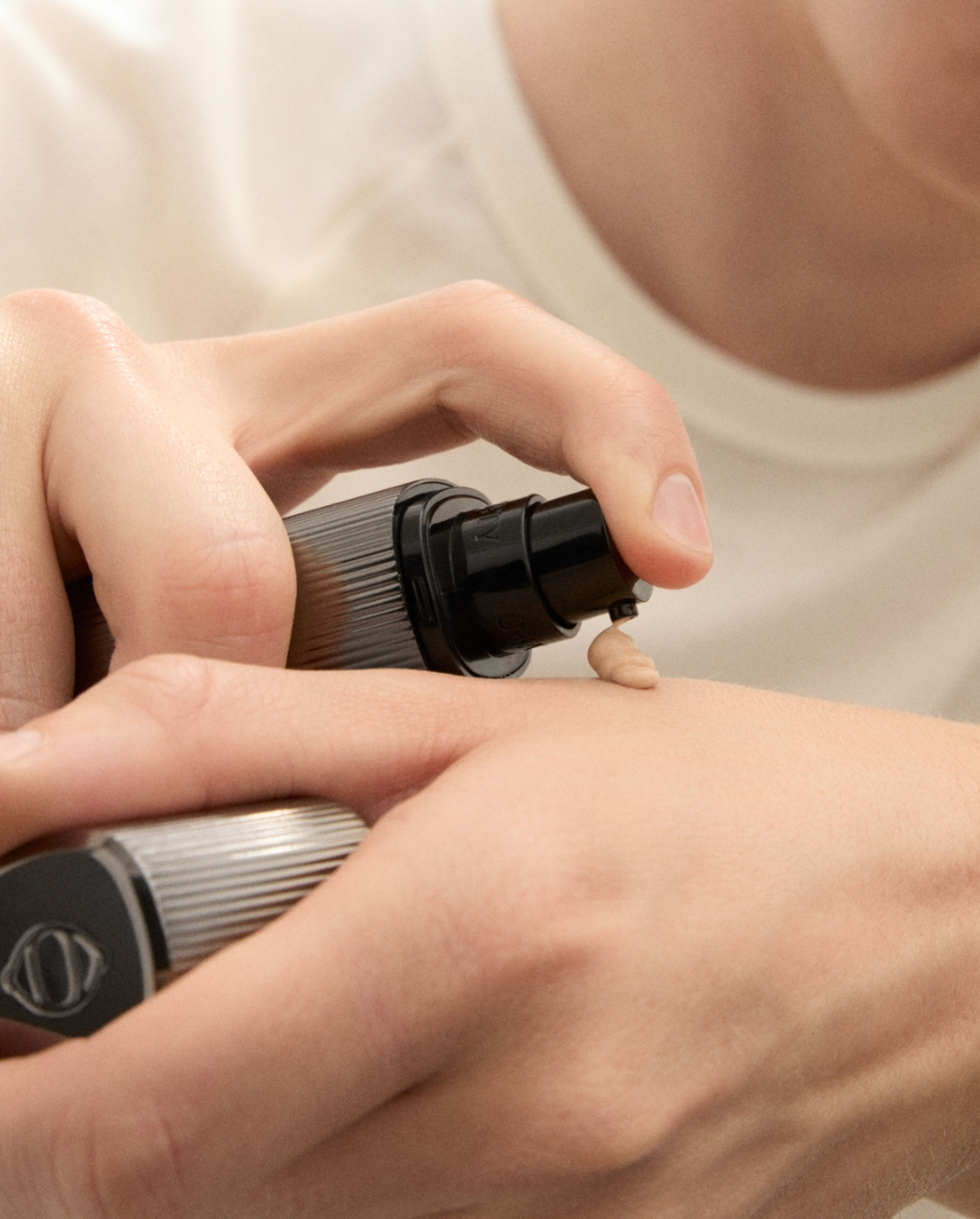 Man brushing his eye brow