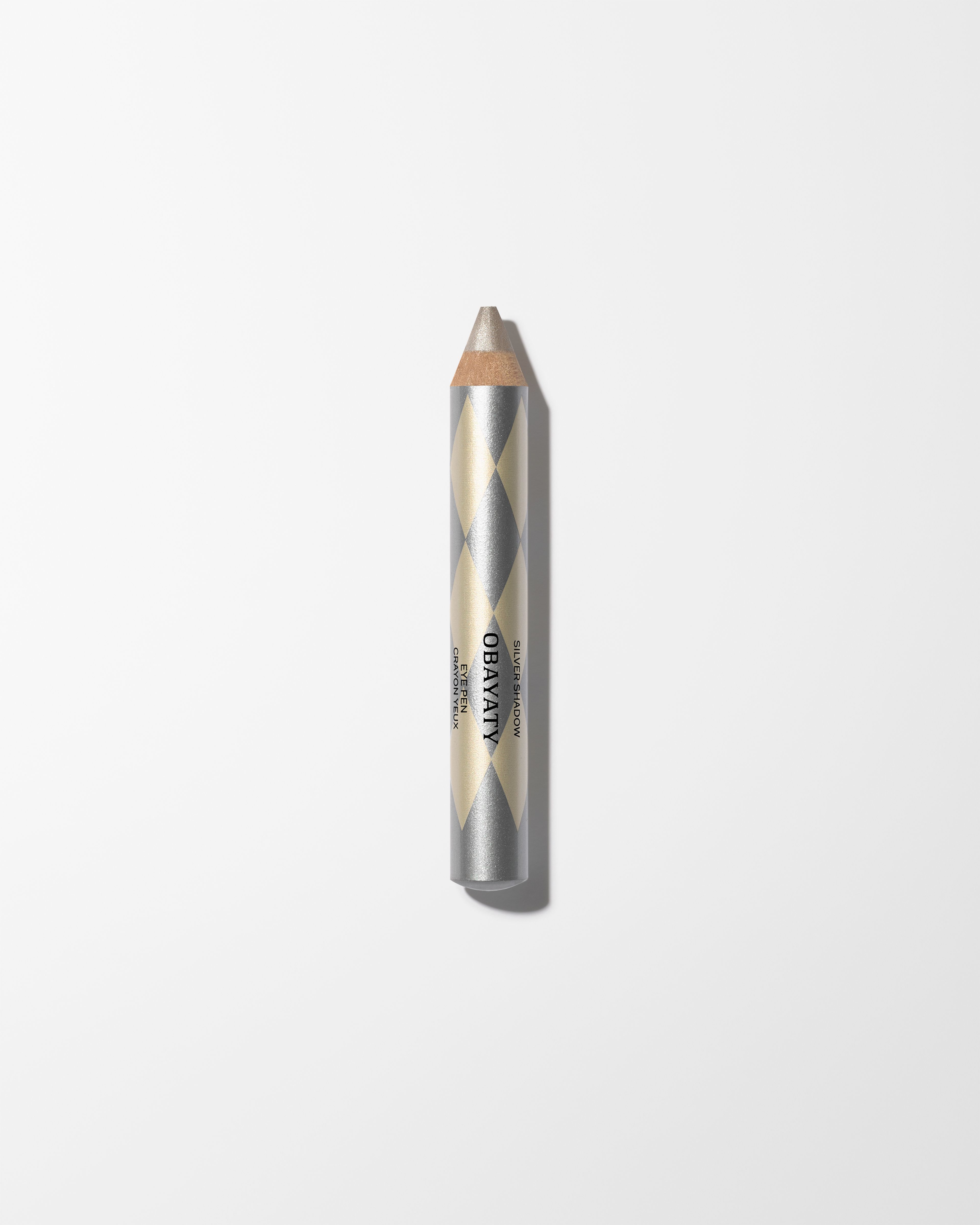 Eye Pen SIlver Shadow laying on a grey surface