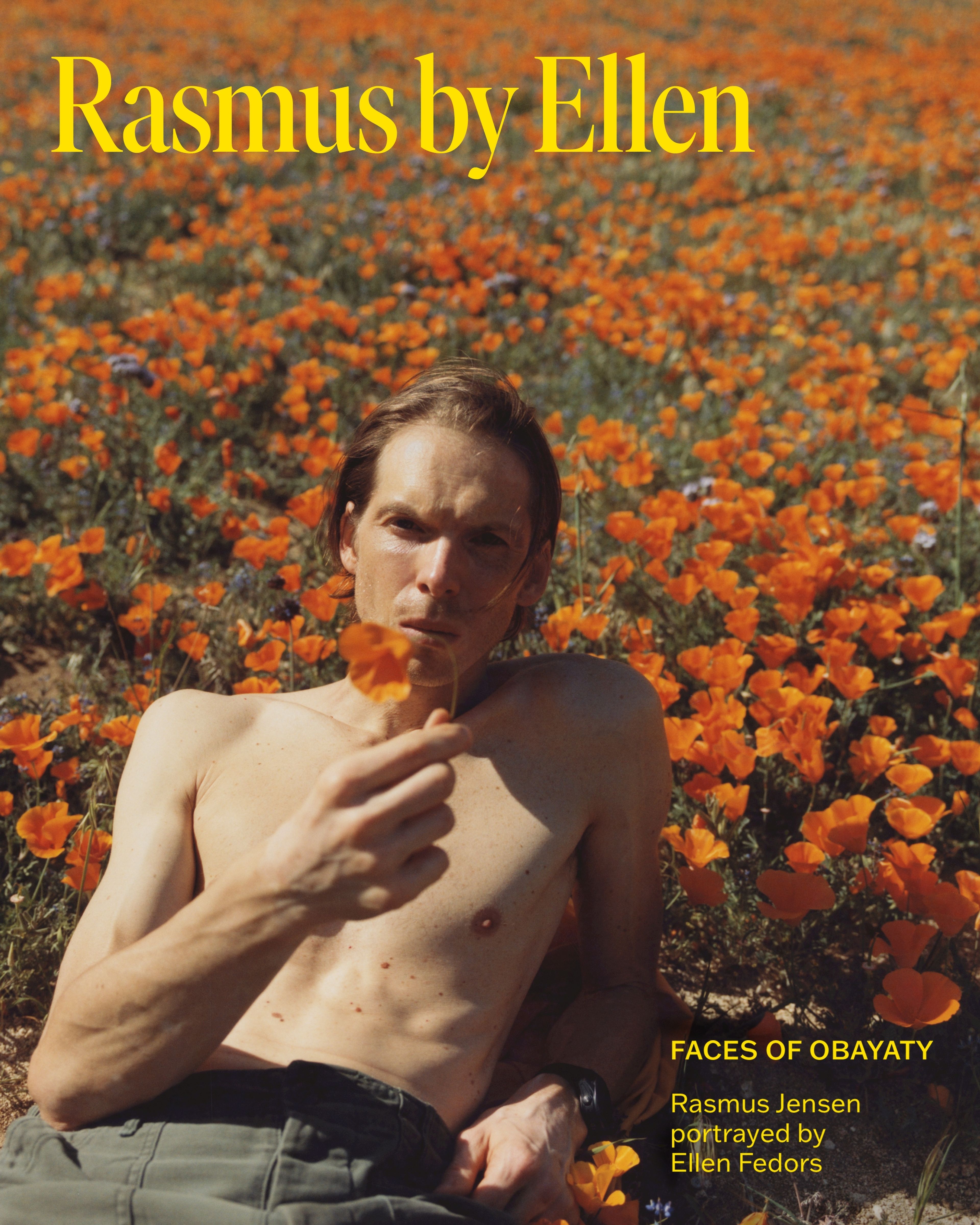 Man laying on a flower field