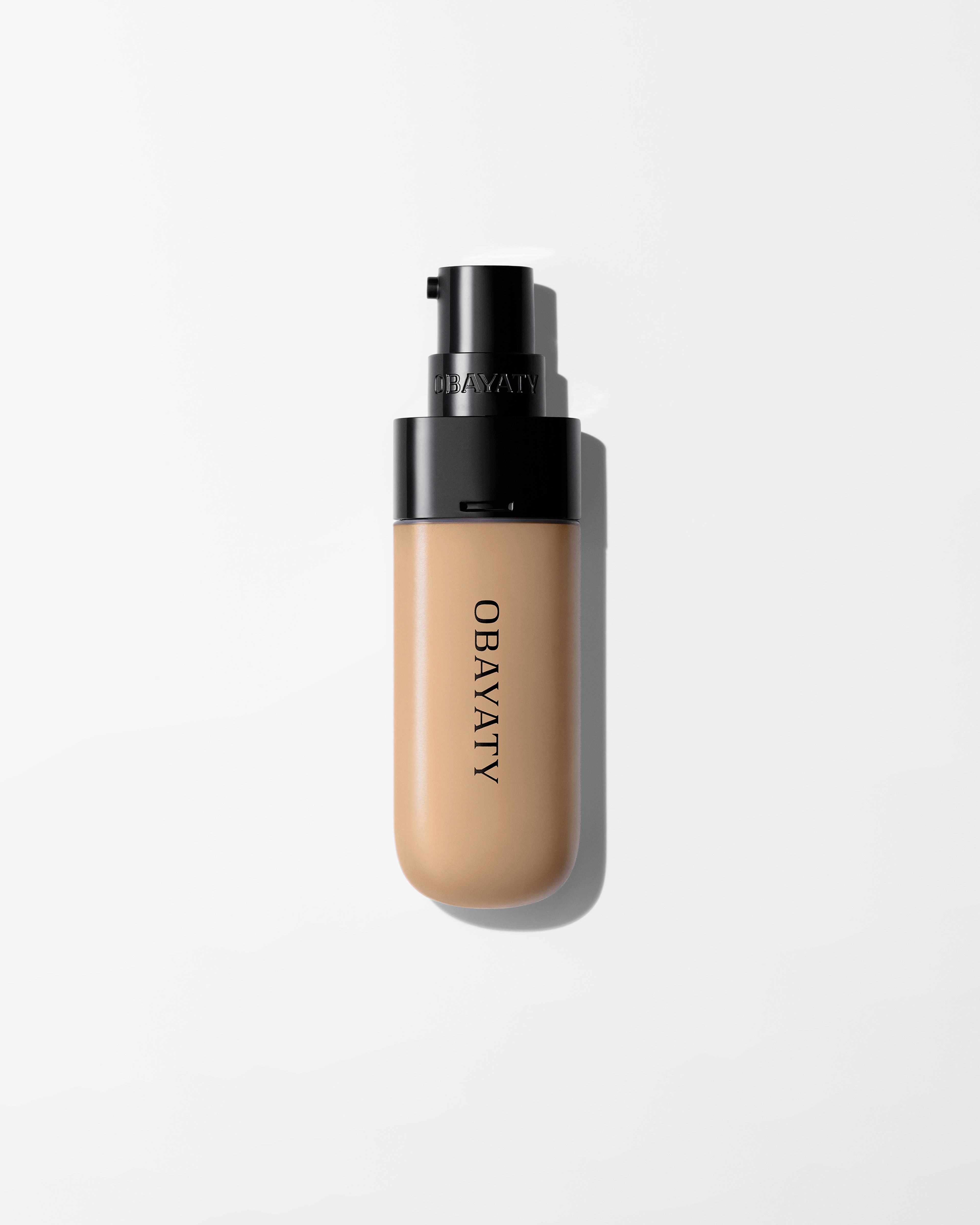 Tinted Moisturizer refill on a grey background