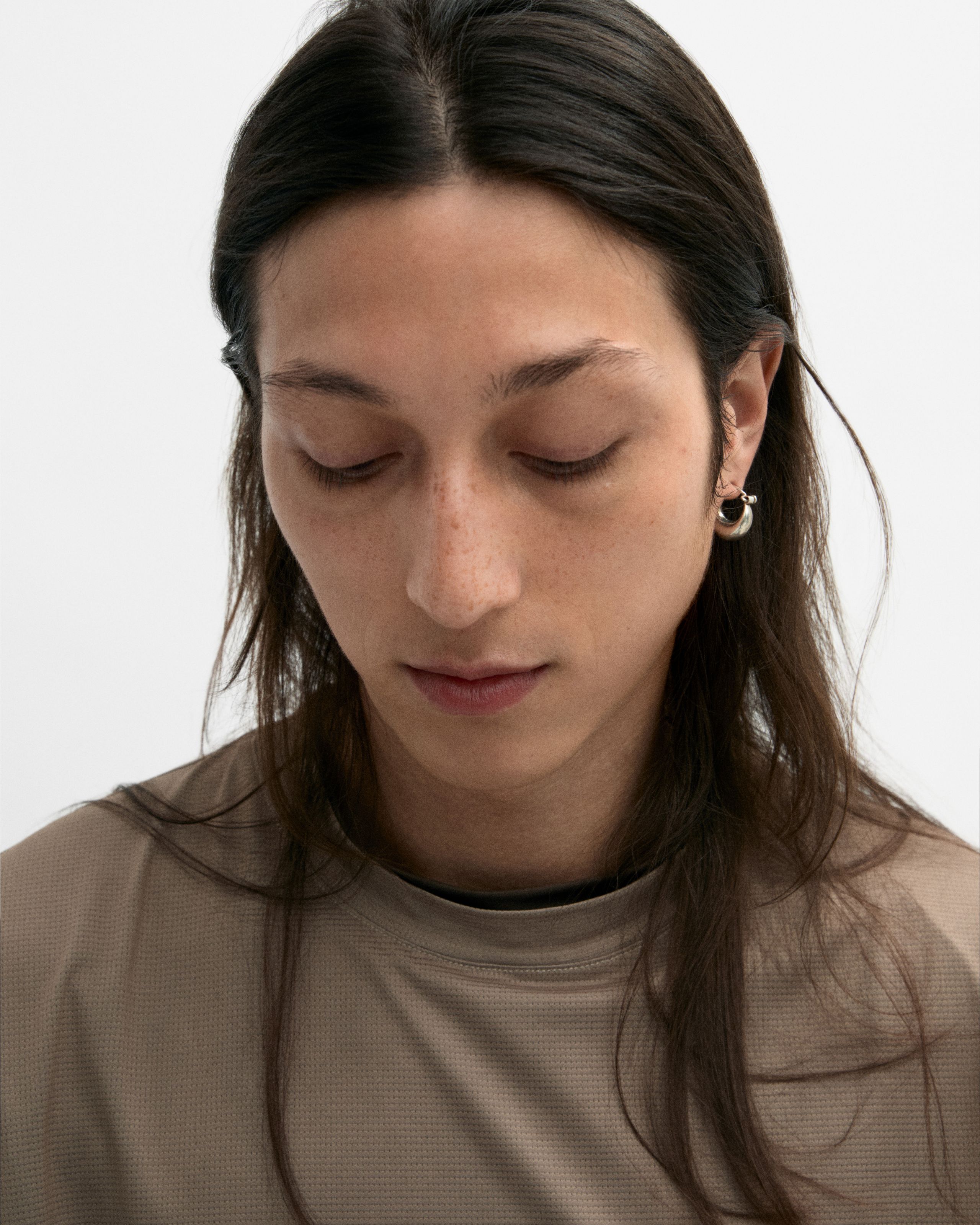 Man looking in to the camera with the mens concealer applied