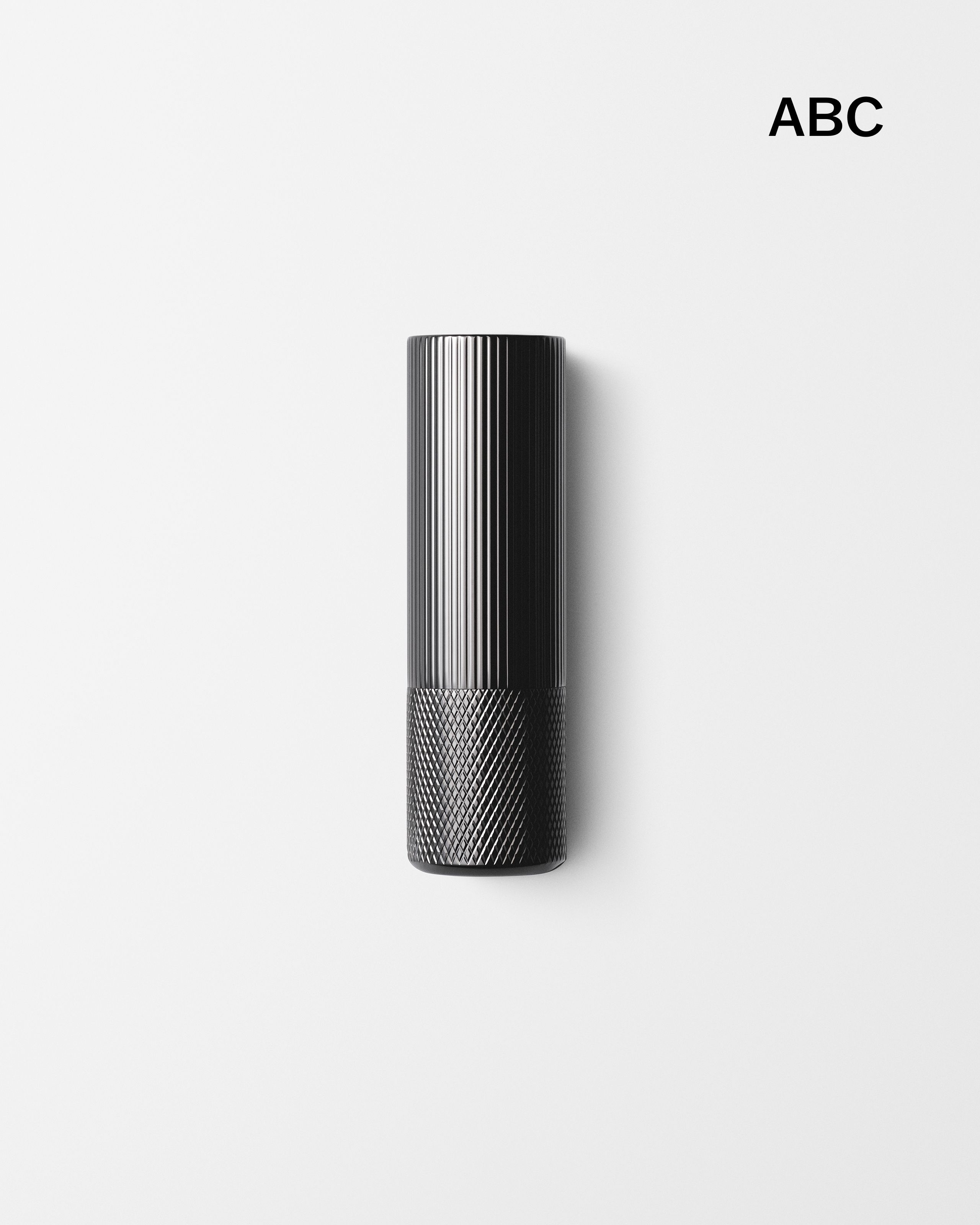 Soothing Lip Balm laying on a grey surface