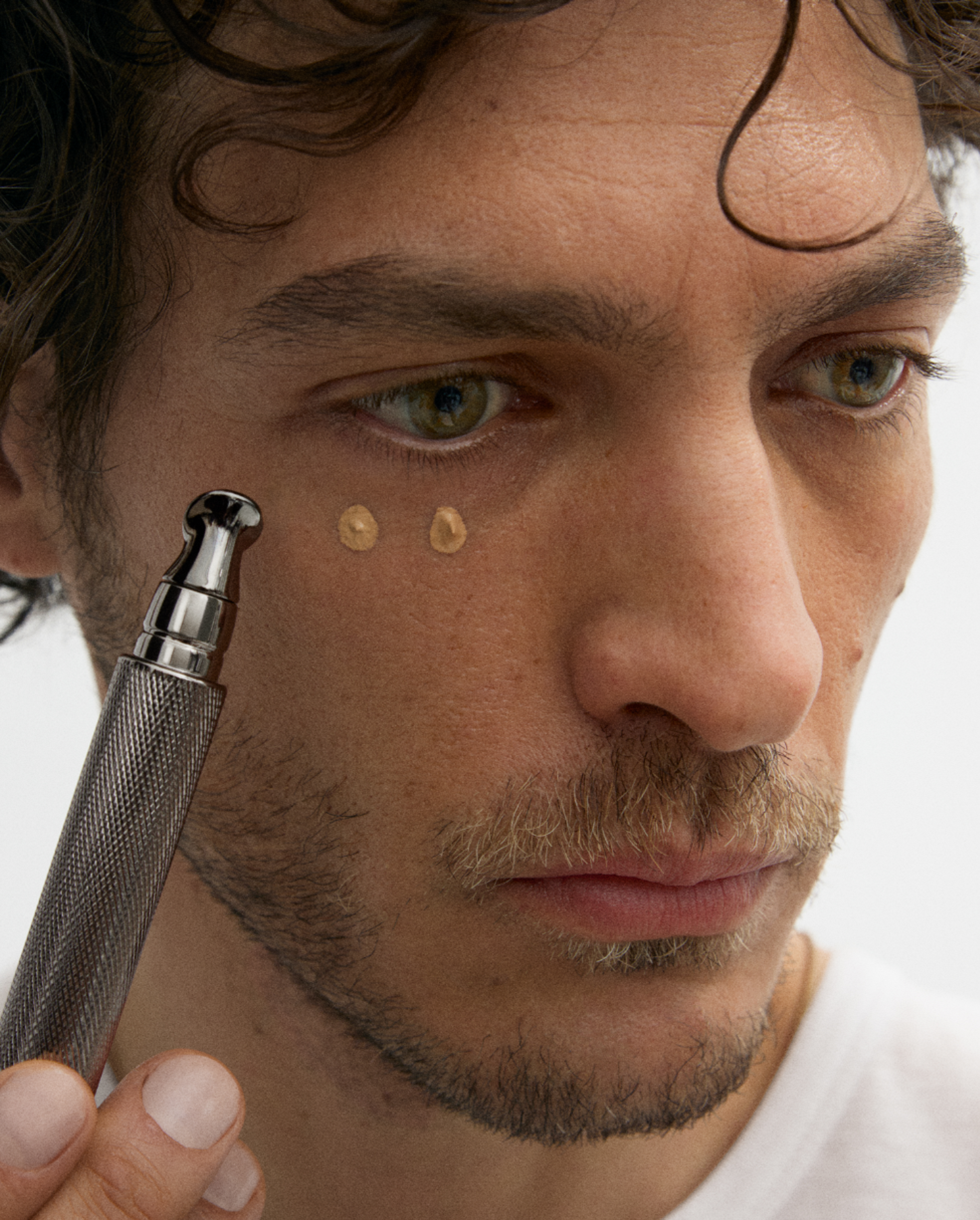 Man applying product