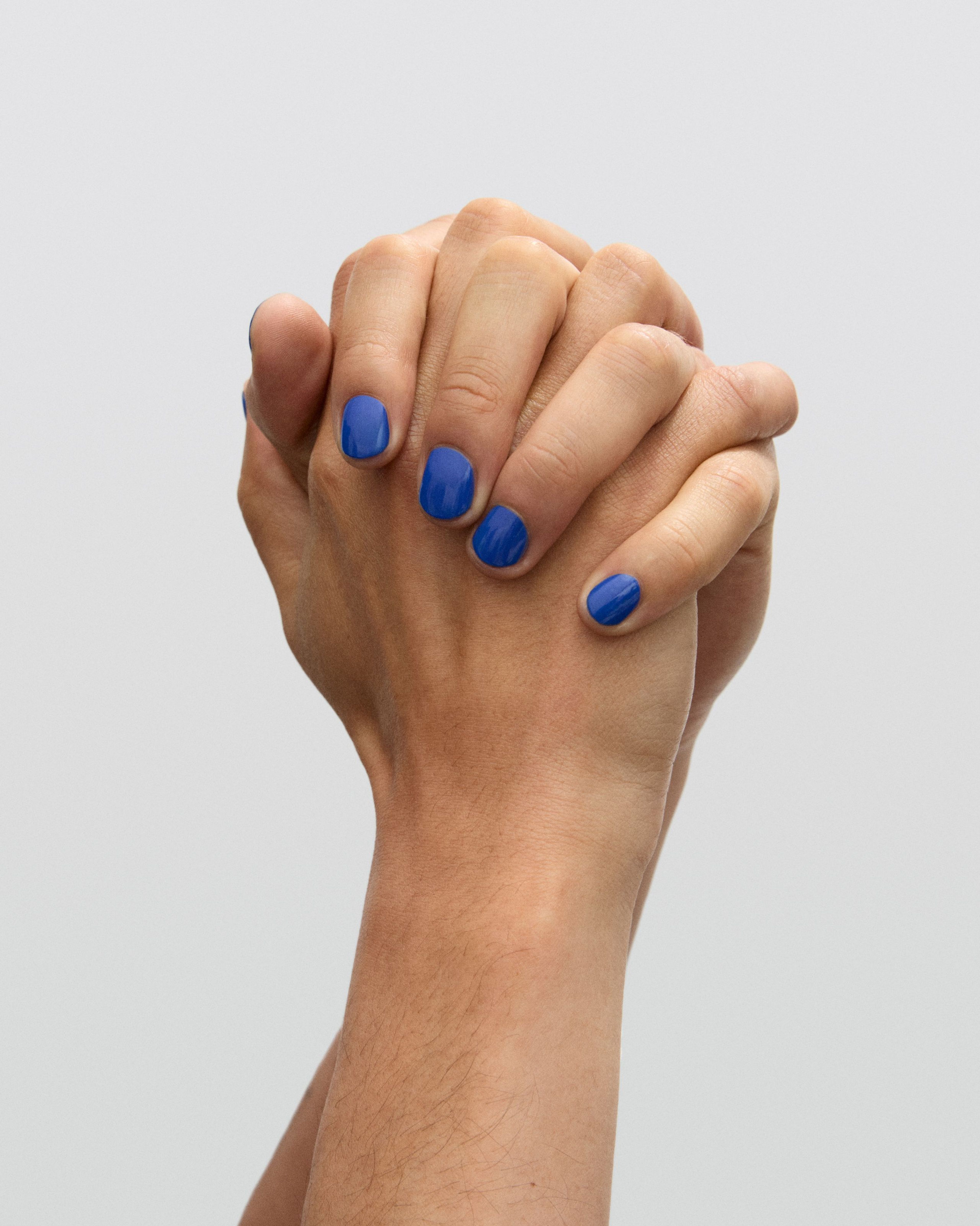 Man holding up his hand Nail Polish Yves applied