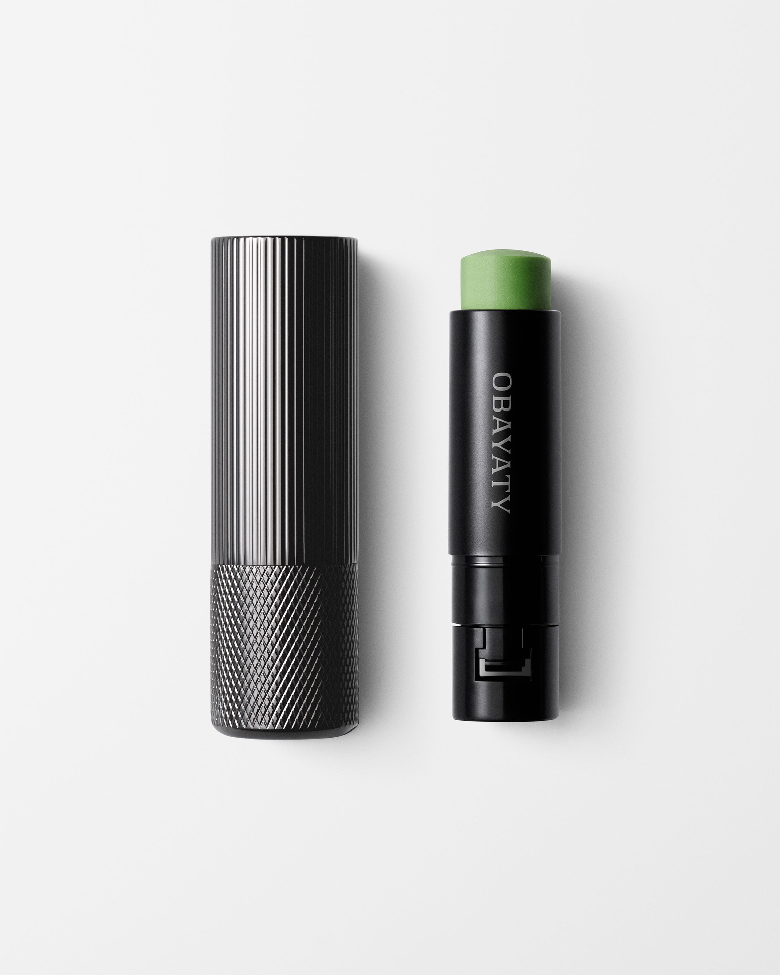 Lip Balm for men laying on a grey surface