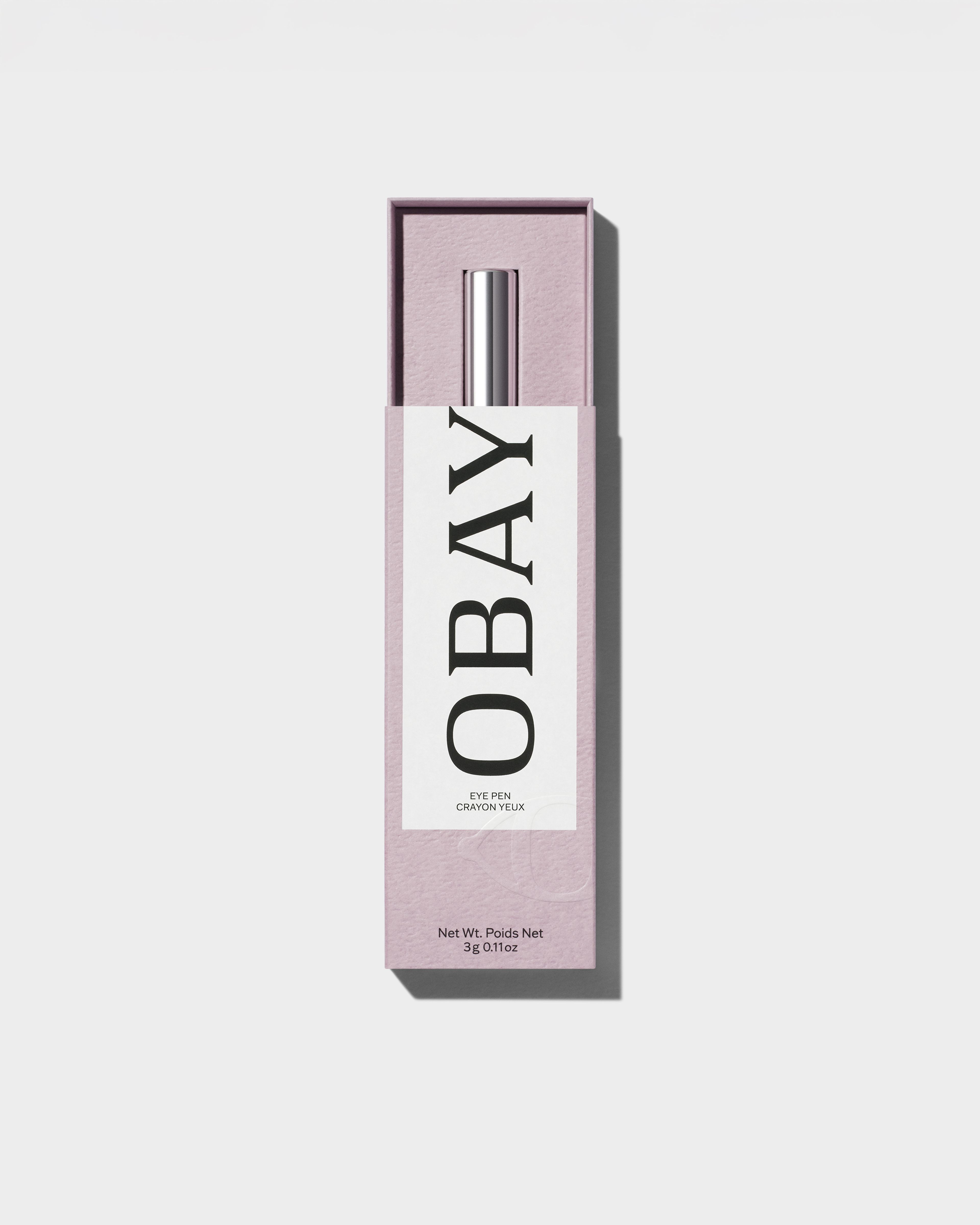 Open Eye Pen packaging laying on a grey surface