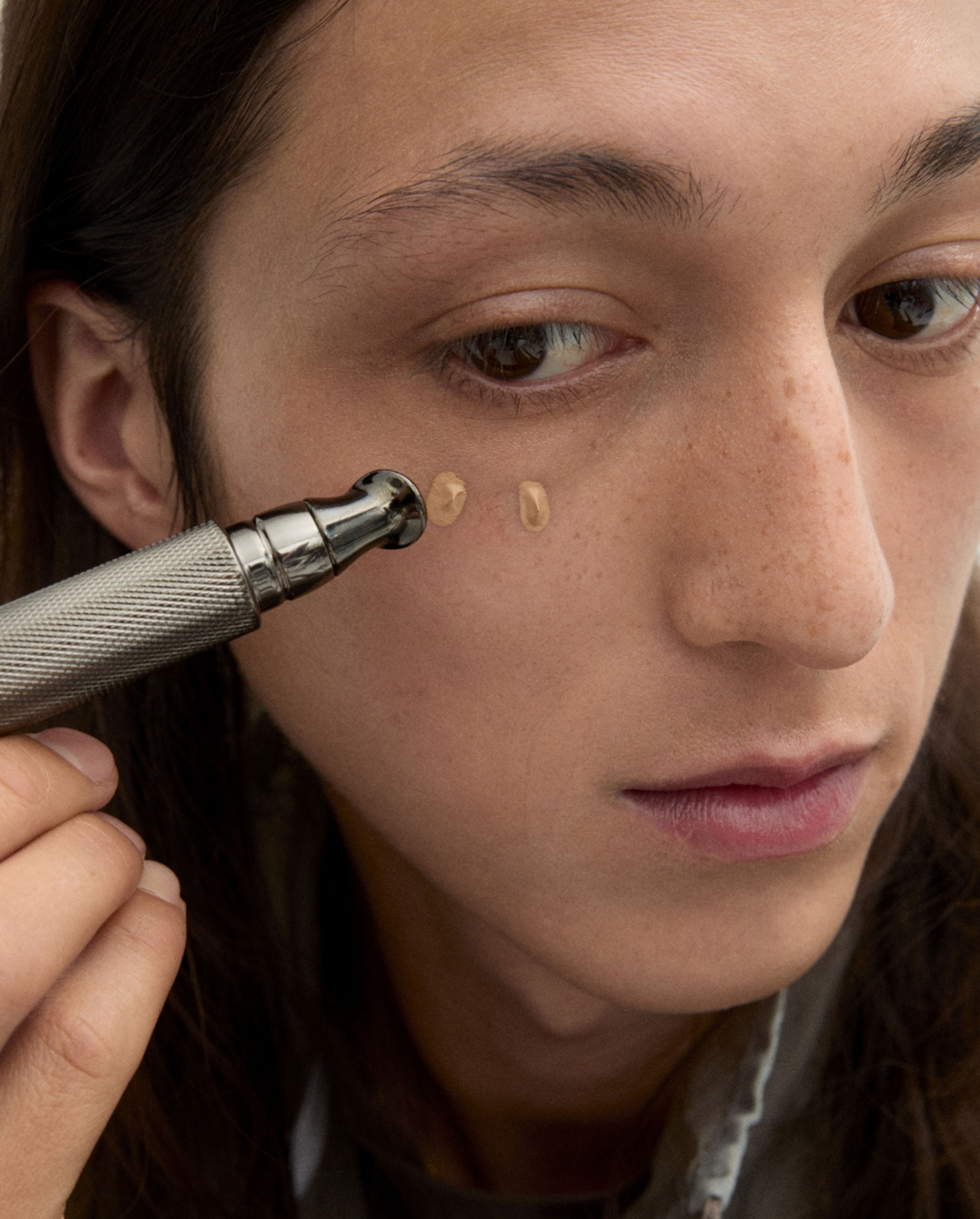 Man applying products