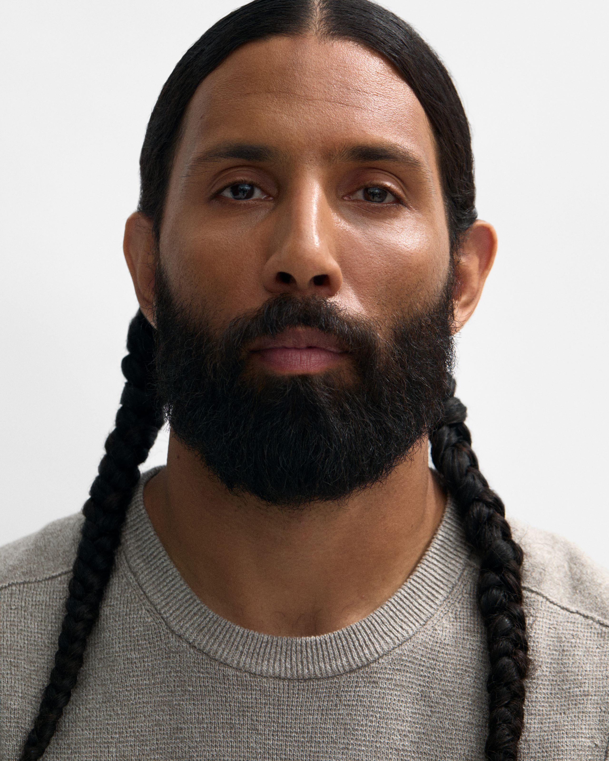 Man looking in to the camera with the mens concealer applied