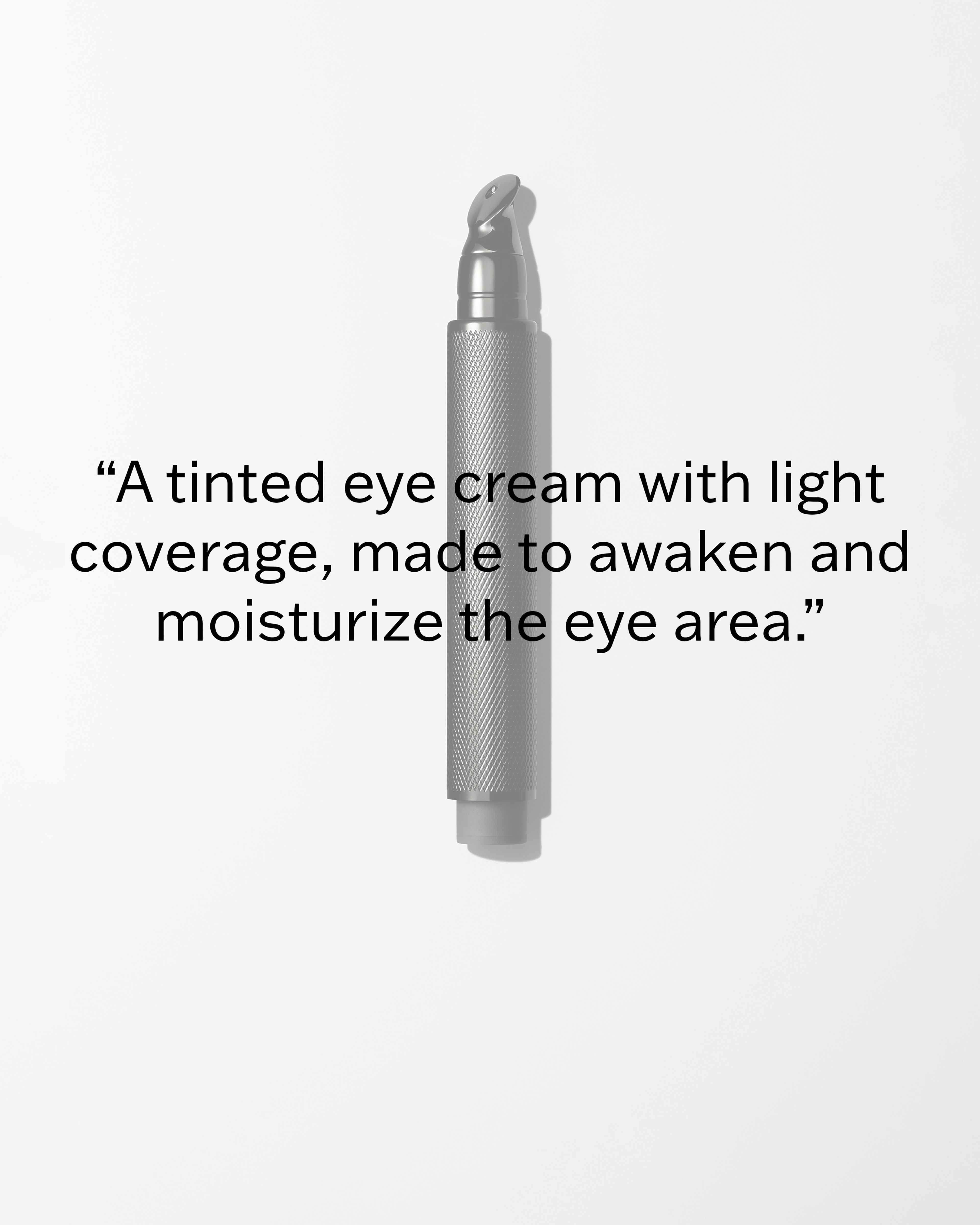 Mens eye cream laying on a grey surface.