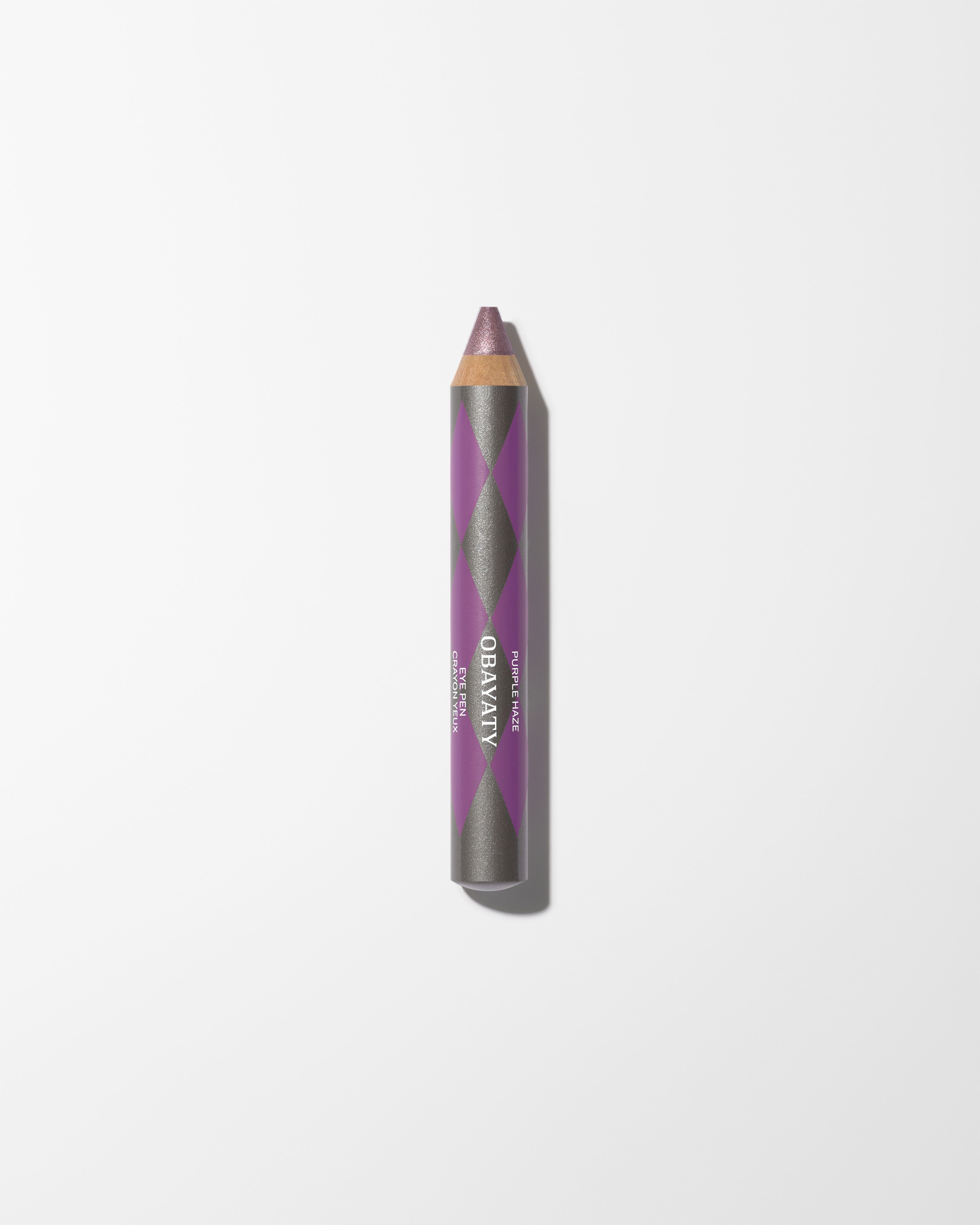 Eye Pen Purple Haze laying on a grey surface