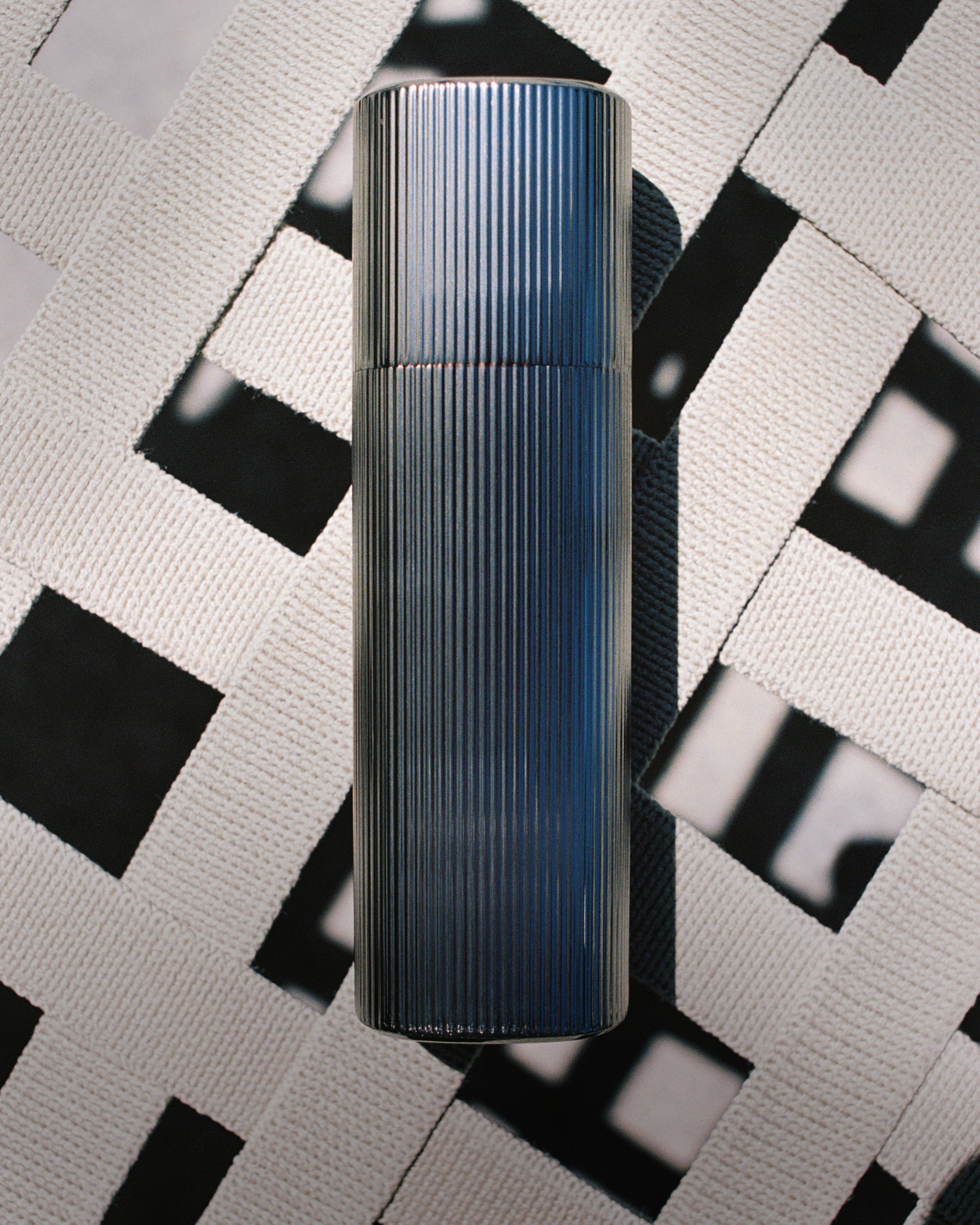 Men's tinted moisturizer laying on sunbed