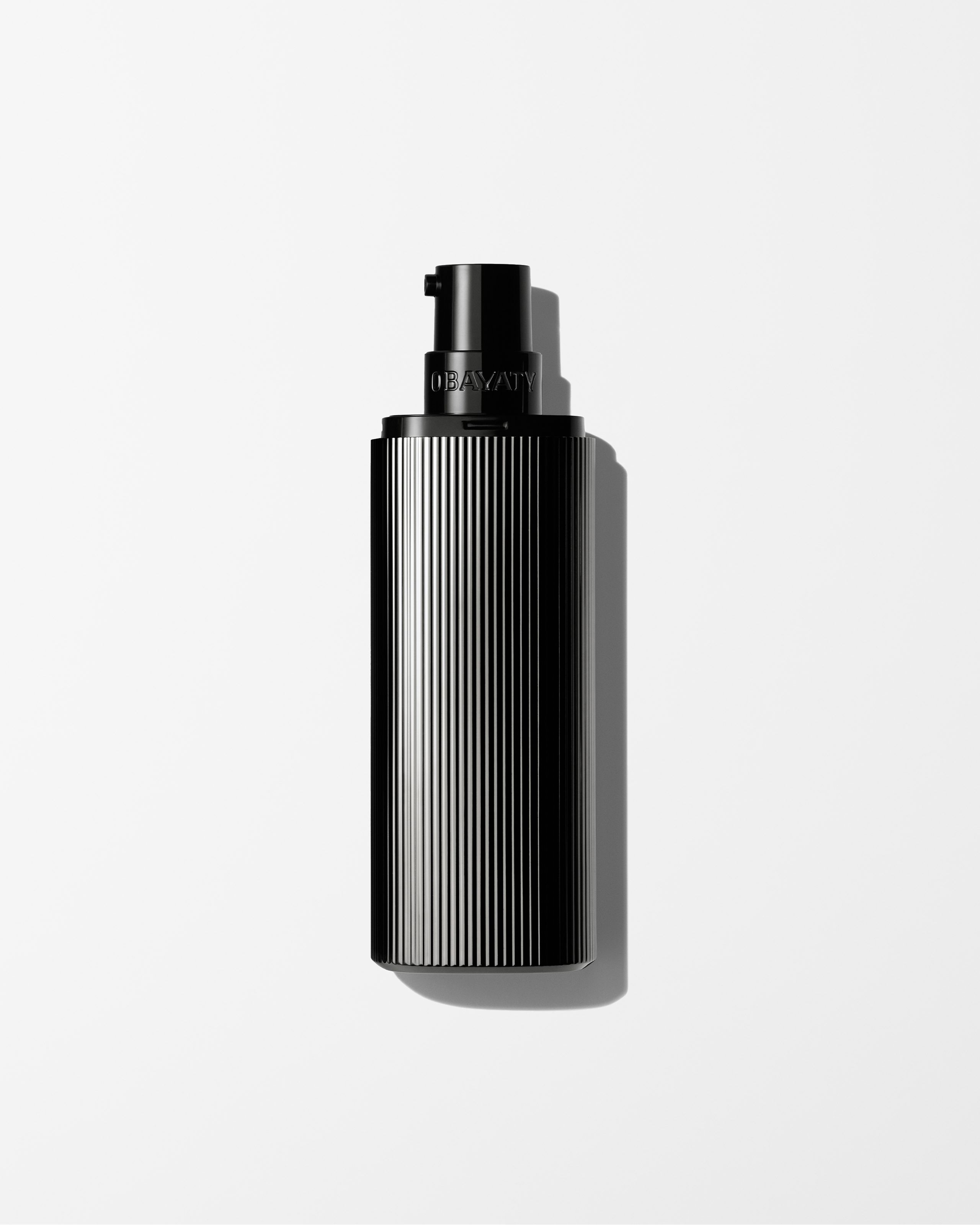 Mens Moisturizer laying on a grey background